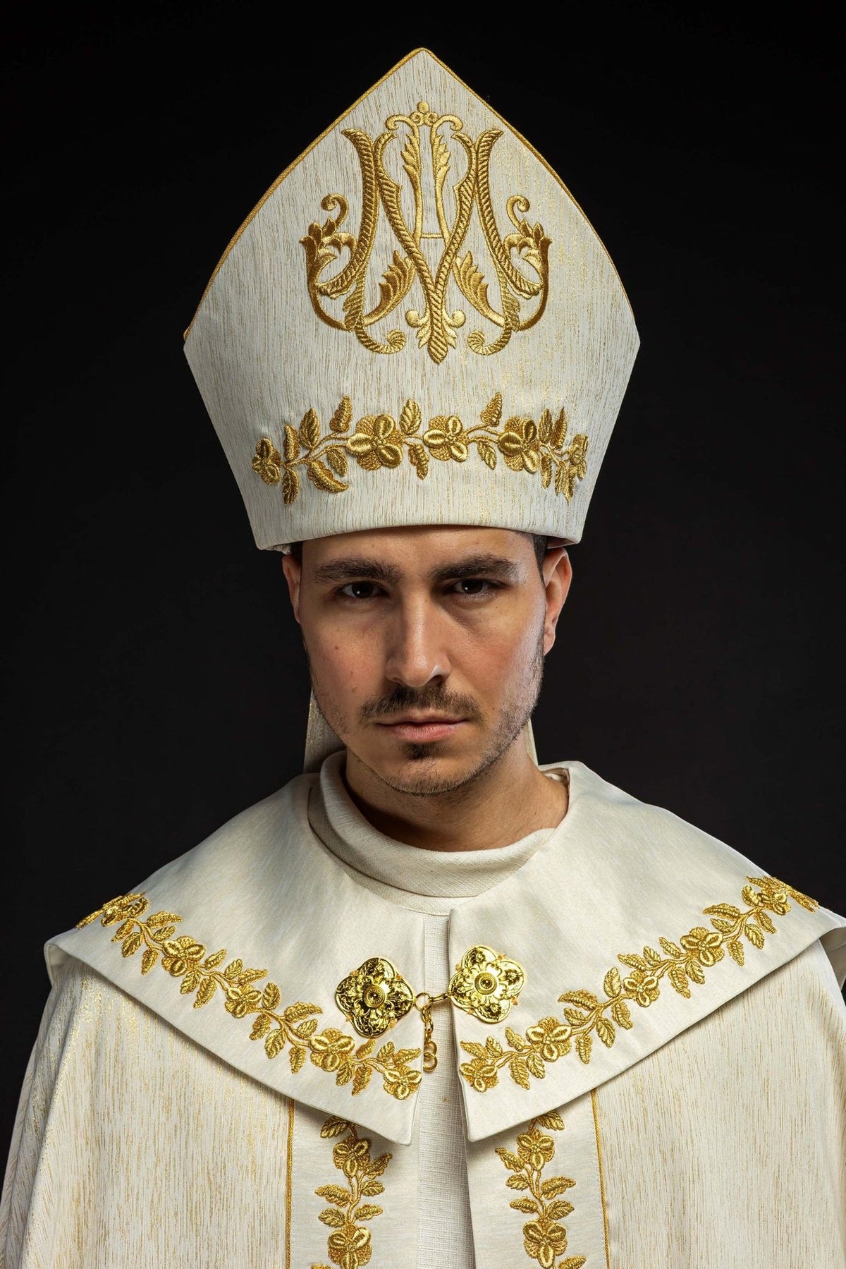 Ecru miter, front close-up with gold Marian symbol and floral embroidery