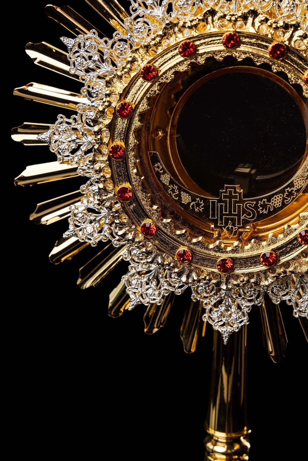 Monstrance detail of the cross finial with a central ruby