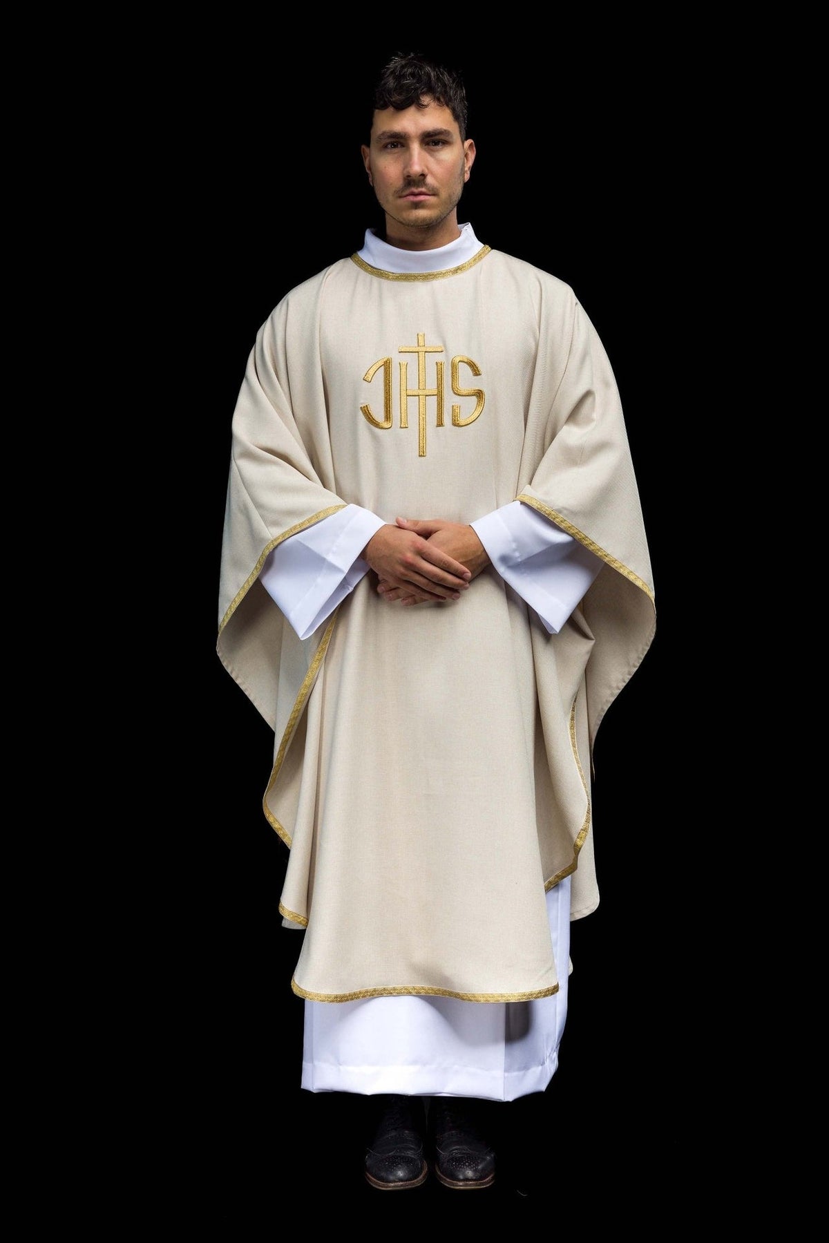 Ecru chasuble front view with gold IHS embroidery and trim