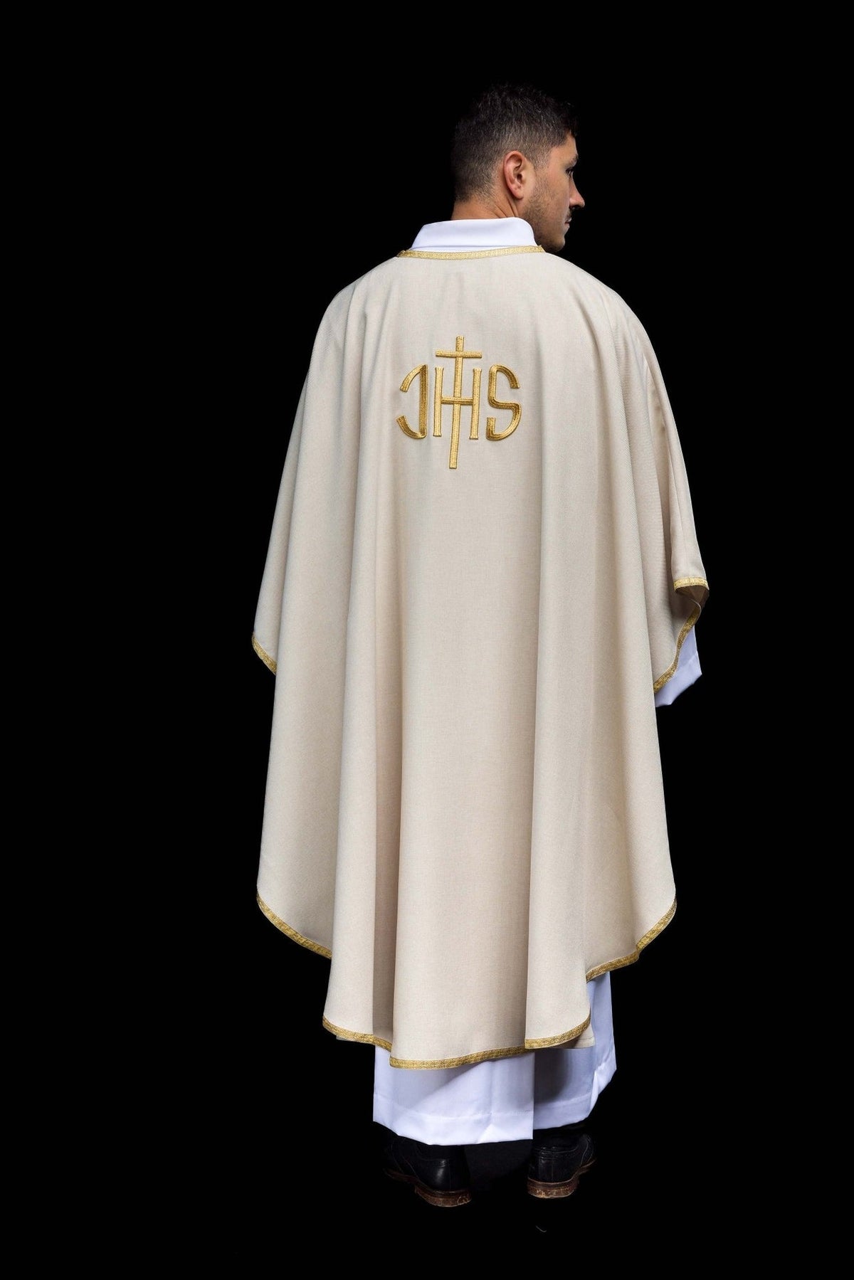 Ecru chasuble angled front view with gold IHS embroidery