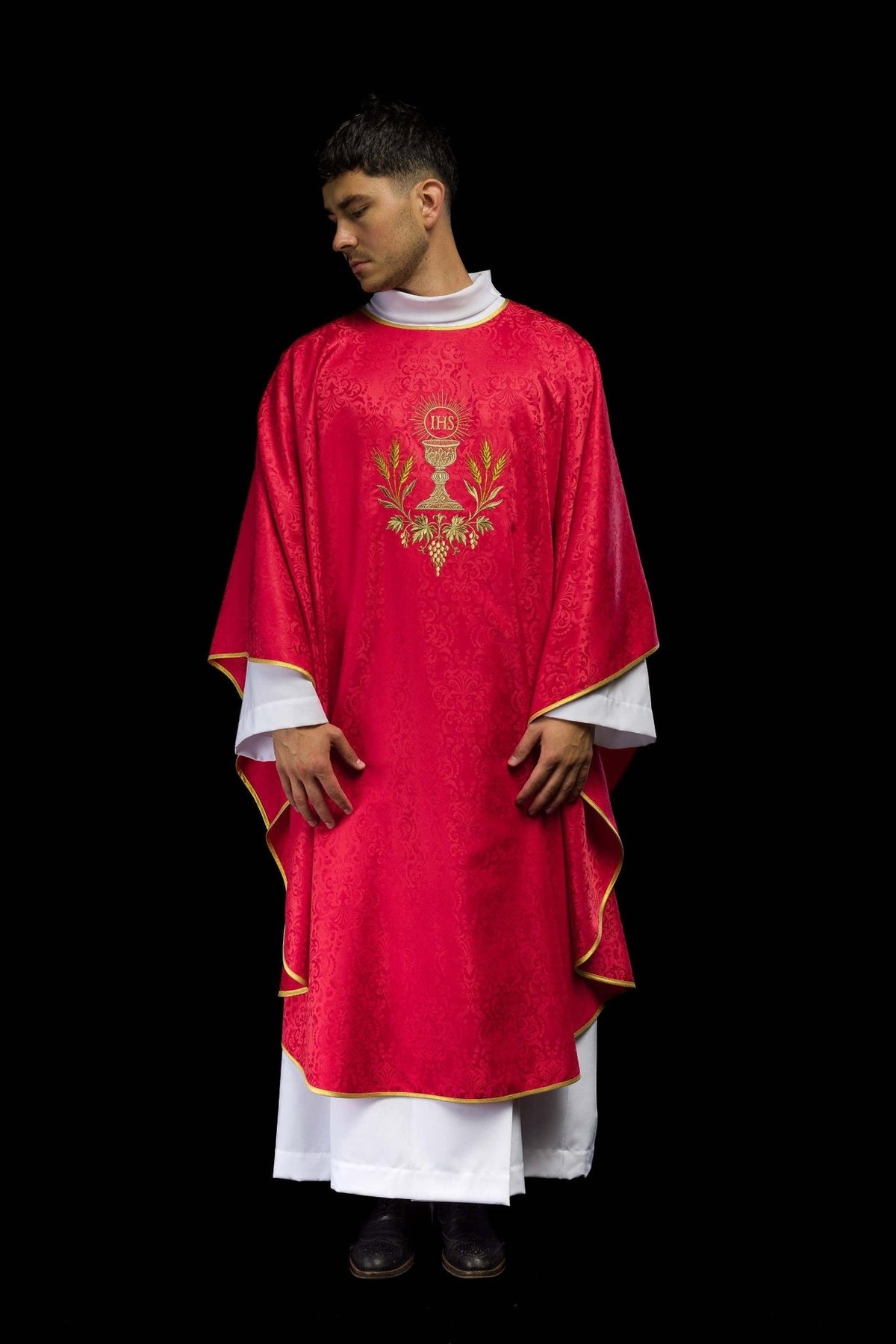 Red chasuble, front worn view with chalice and wheat embroidery