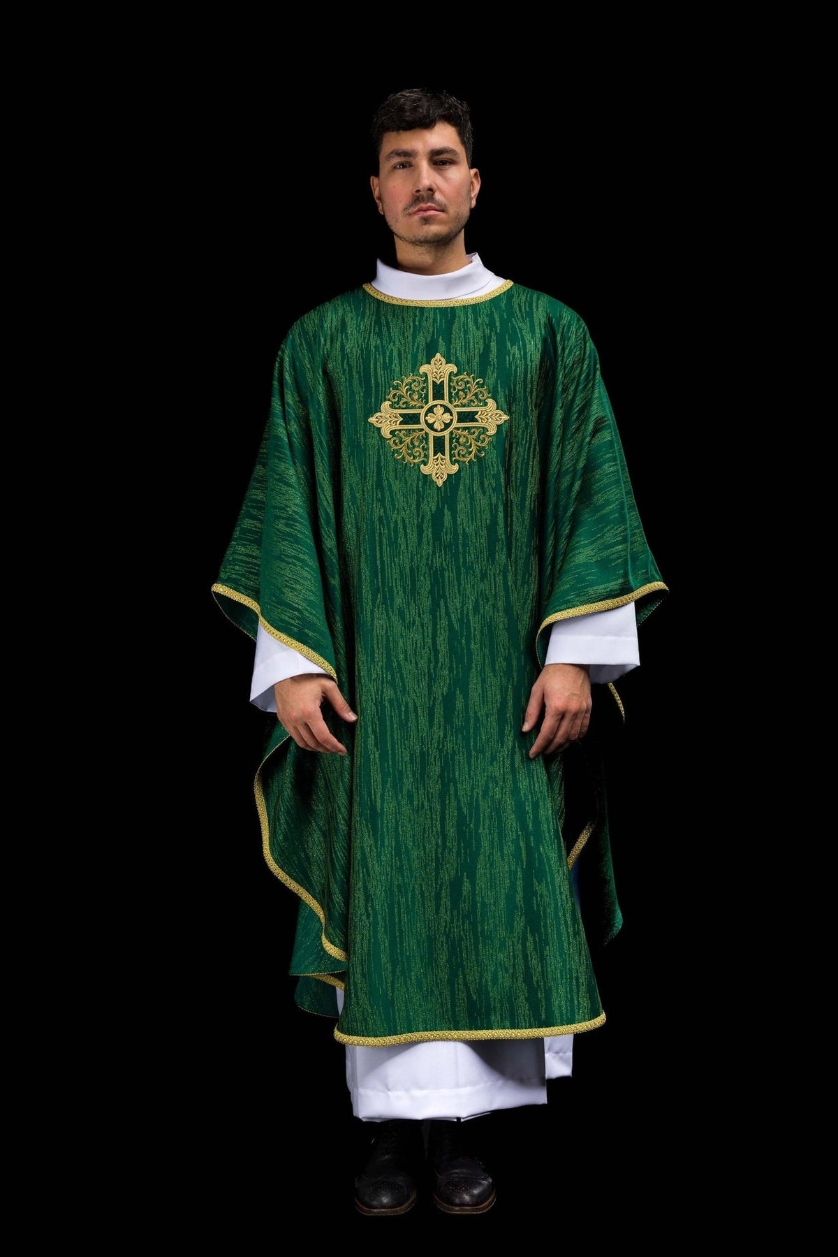 Green chasuble front worn view with gold embroidered cross