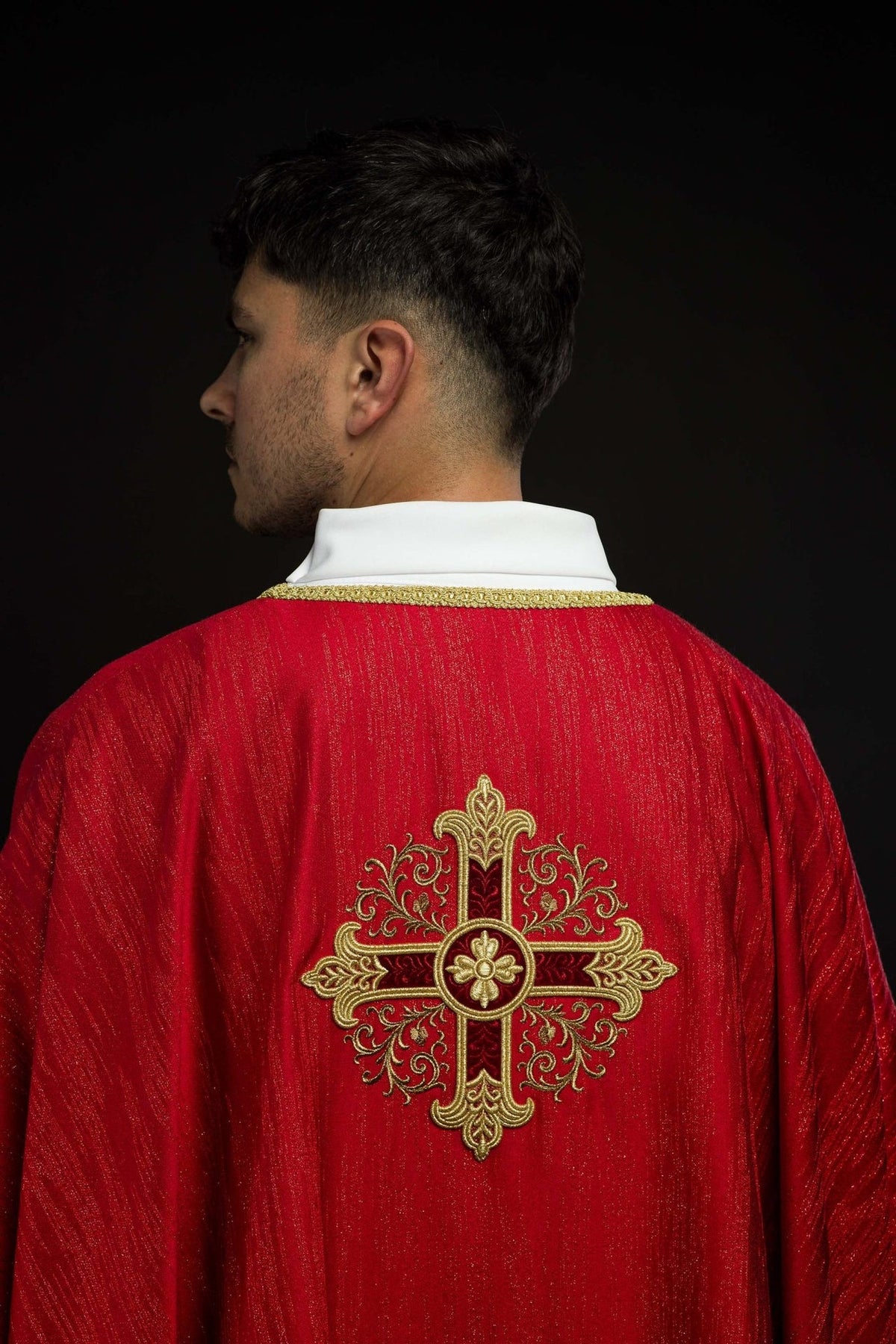 Red chasuble back view with gold cross embroidery