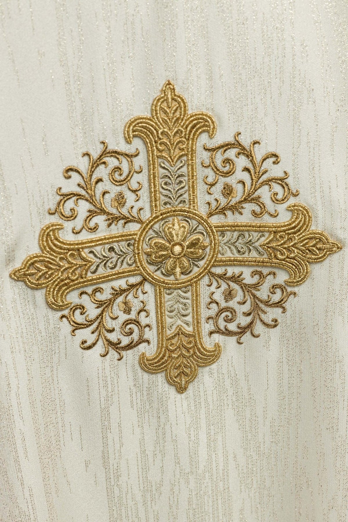 Ecru chasuble close-up of ornate gold embroidered cross