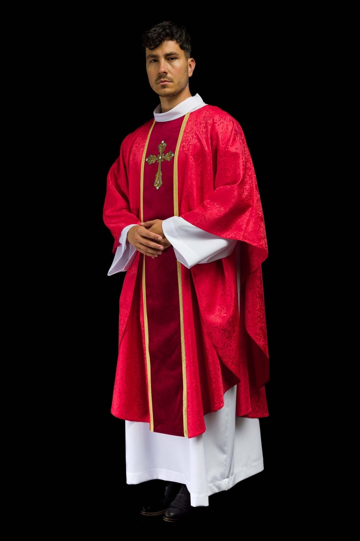 Red chasuble three-quarter view with cross embroidery and jacquard fabric