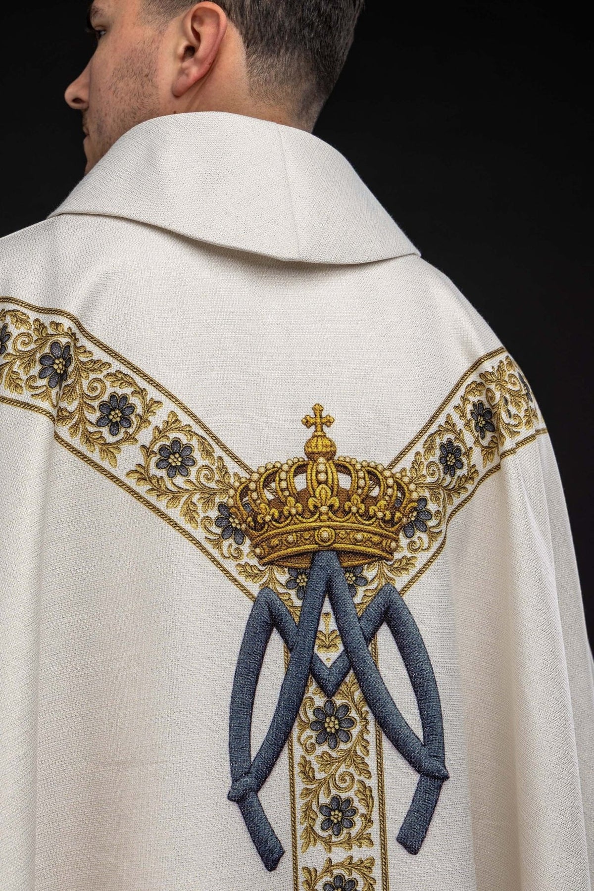 Marian chasuble back view with Marian symbol, crown and floral orphrey