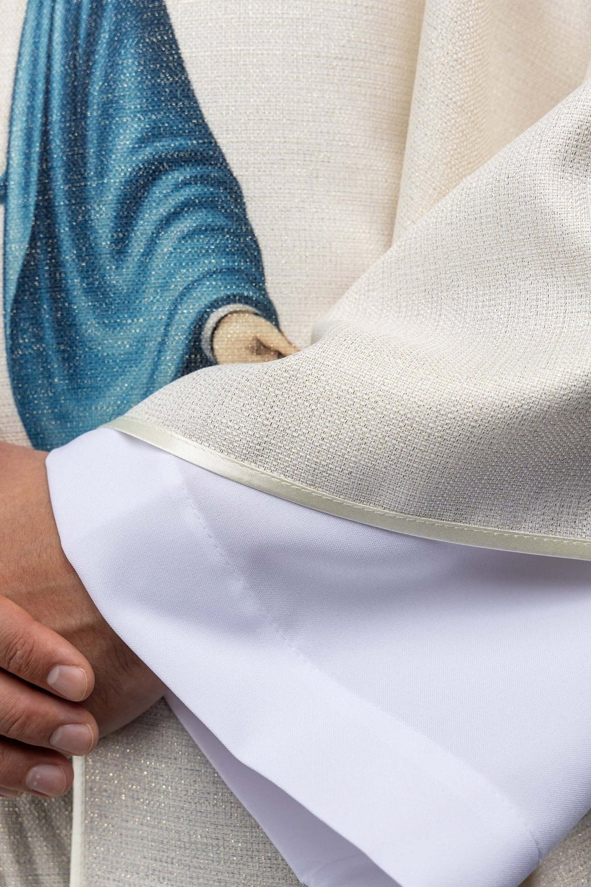 Chasuble with Our Lady image, close-up of the blue robe and ecru fabric