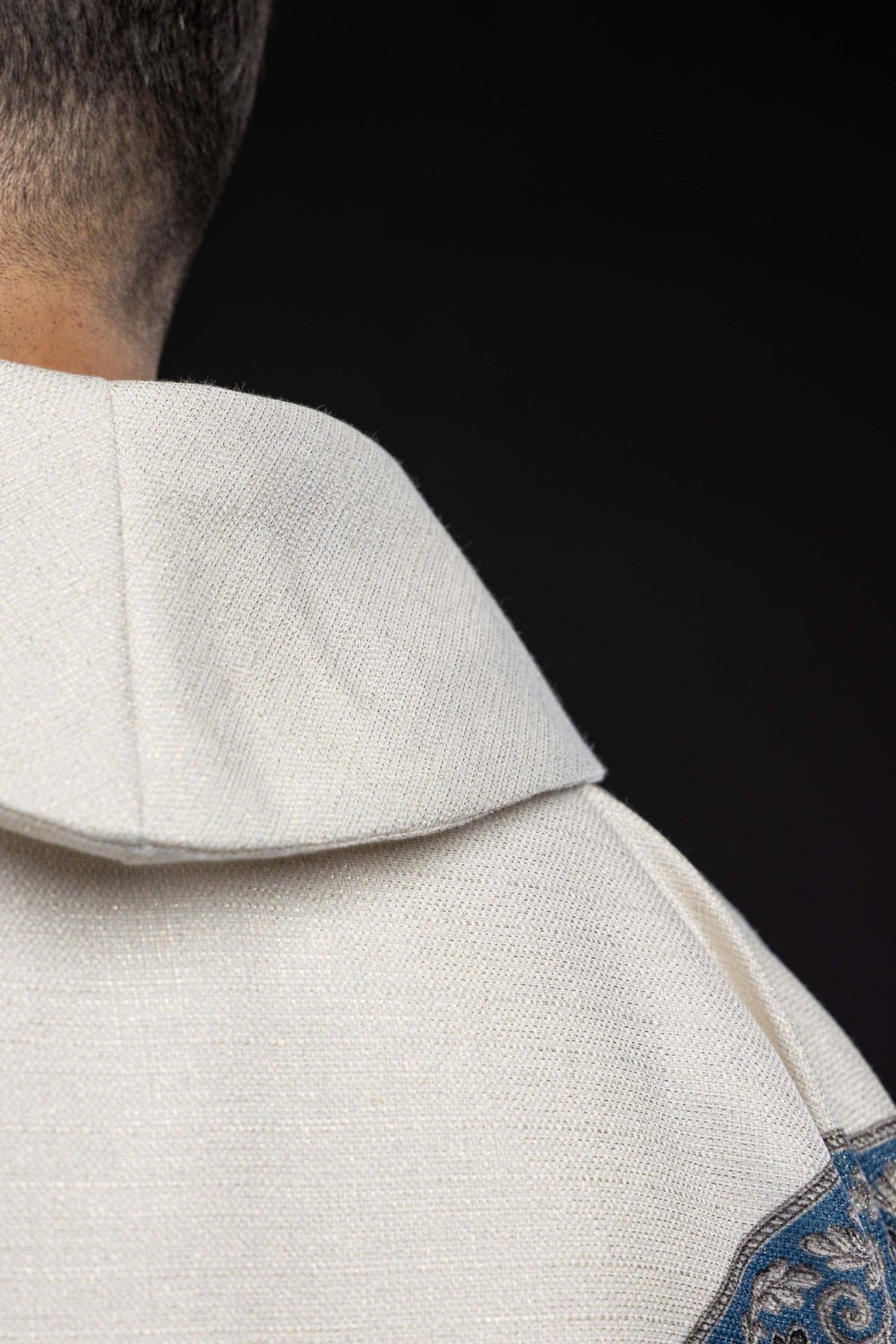 Chasuble with Our Lady image, close-up of the light blue floral shoulder trim