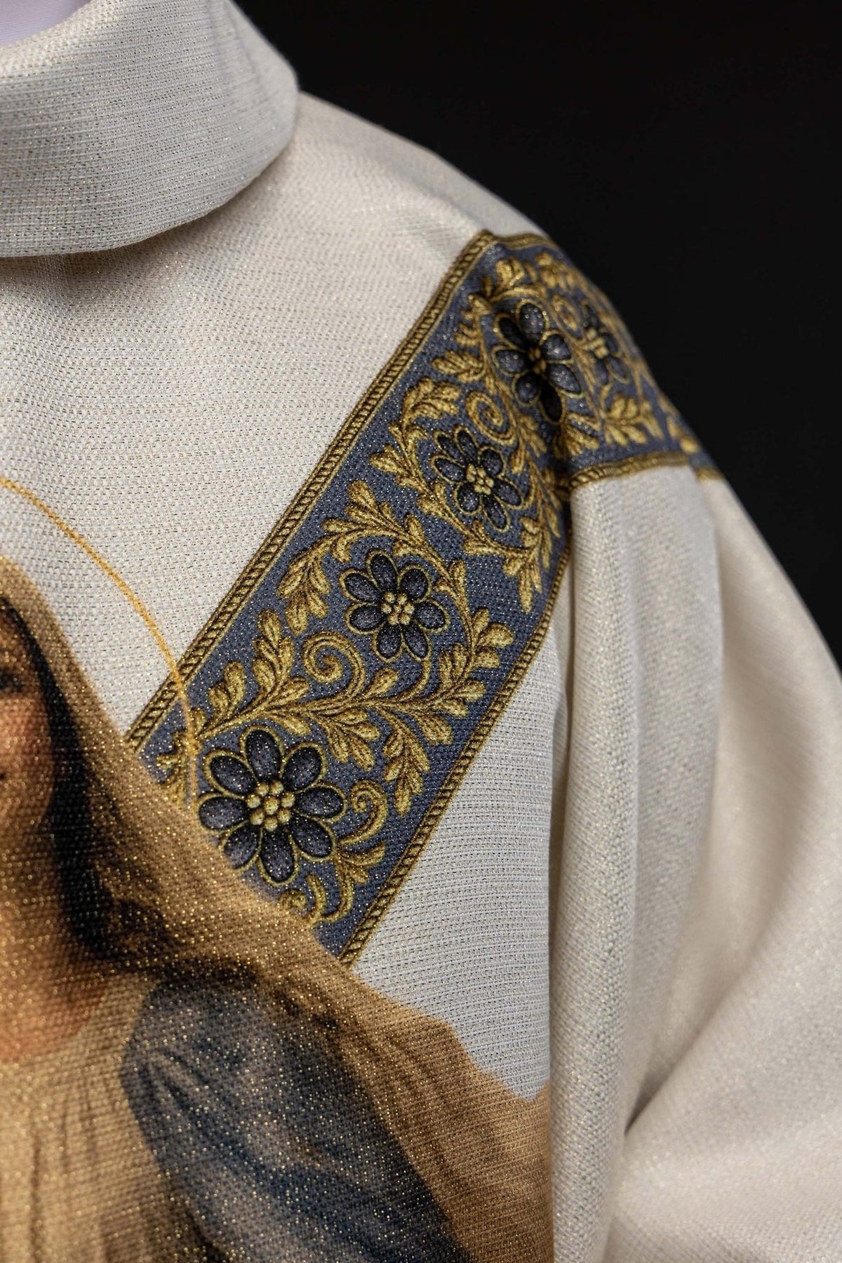 Marian chasuble worn front view with Our Lady image and gold-trimmed sleeves