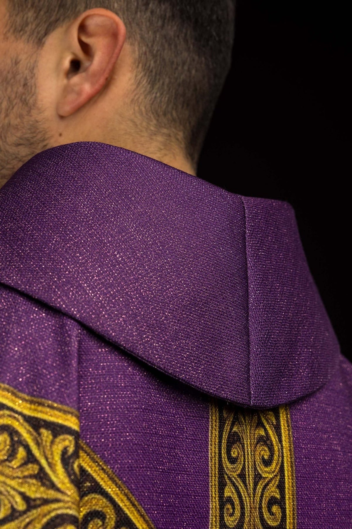 Pax chasuble close-up of the purple collar and gold embroidered trim
