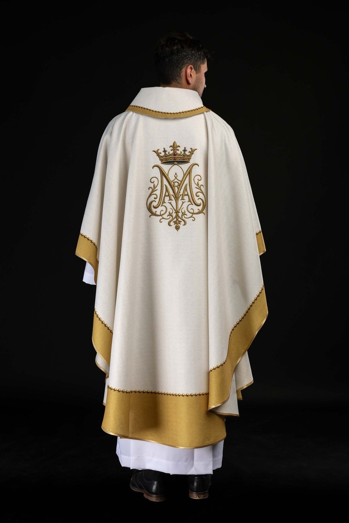Printed chasuble close-up of crowned embroidered Marian monogram