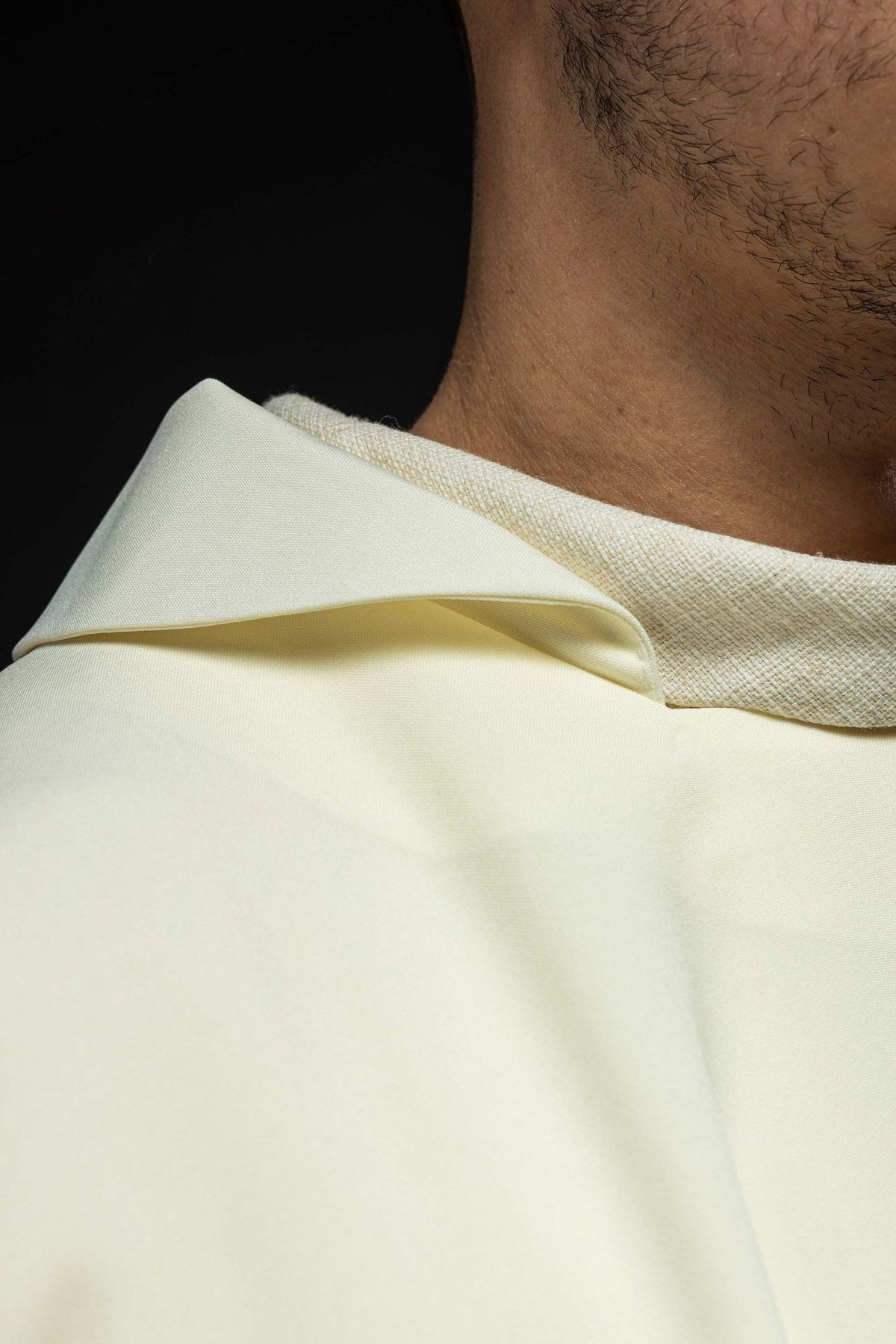 Chasuble close-up showing the wide ecru collar