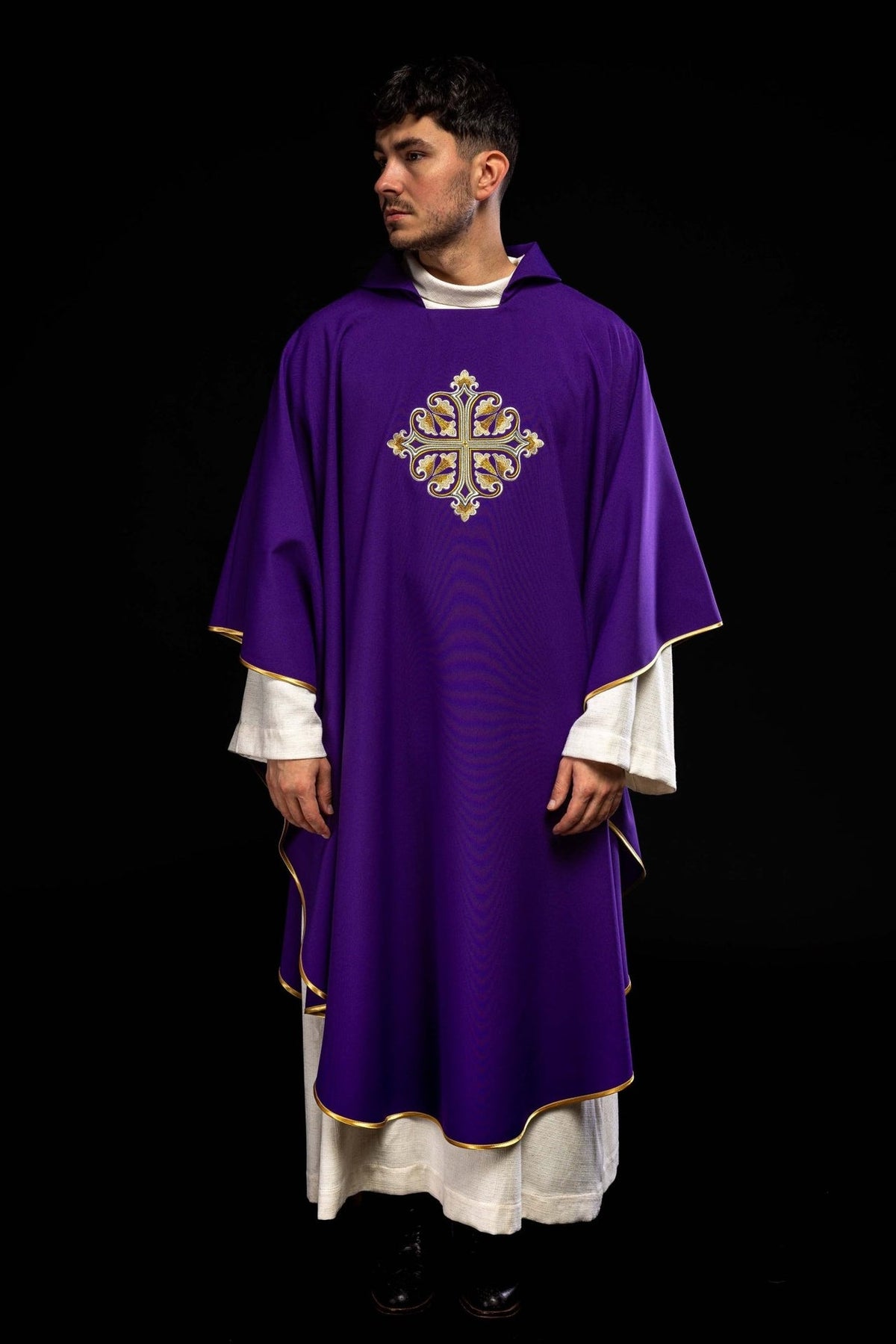 Purple chasuble, full front view with embroidered gold cross and gold trim