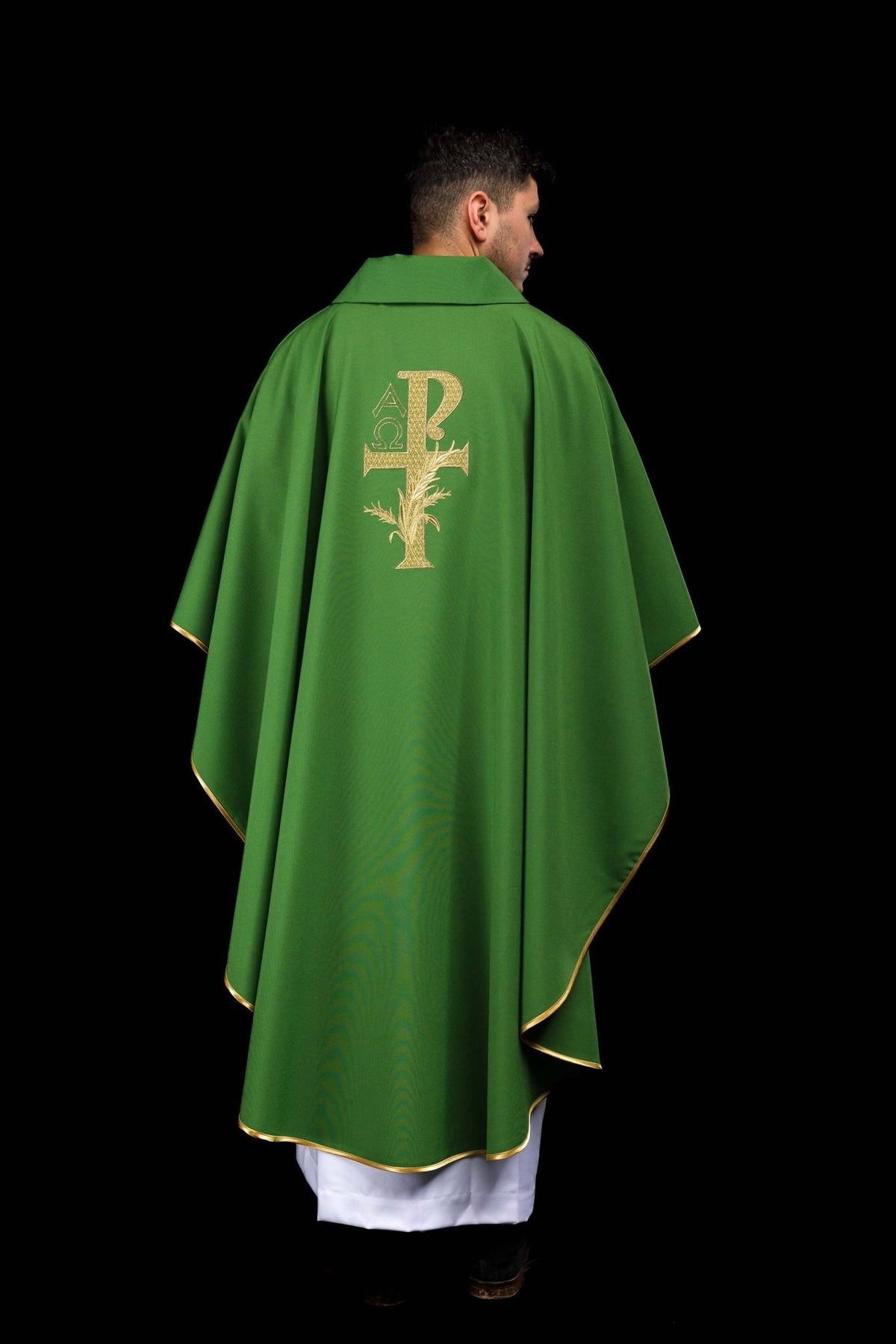 Green chasuble back view showing wide collar and gold trim