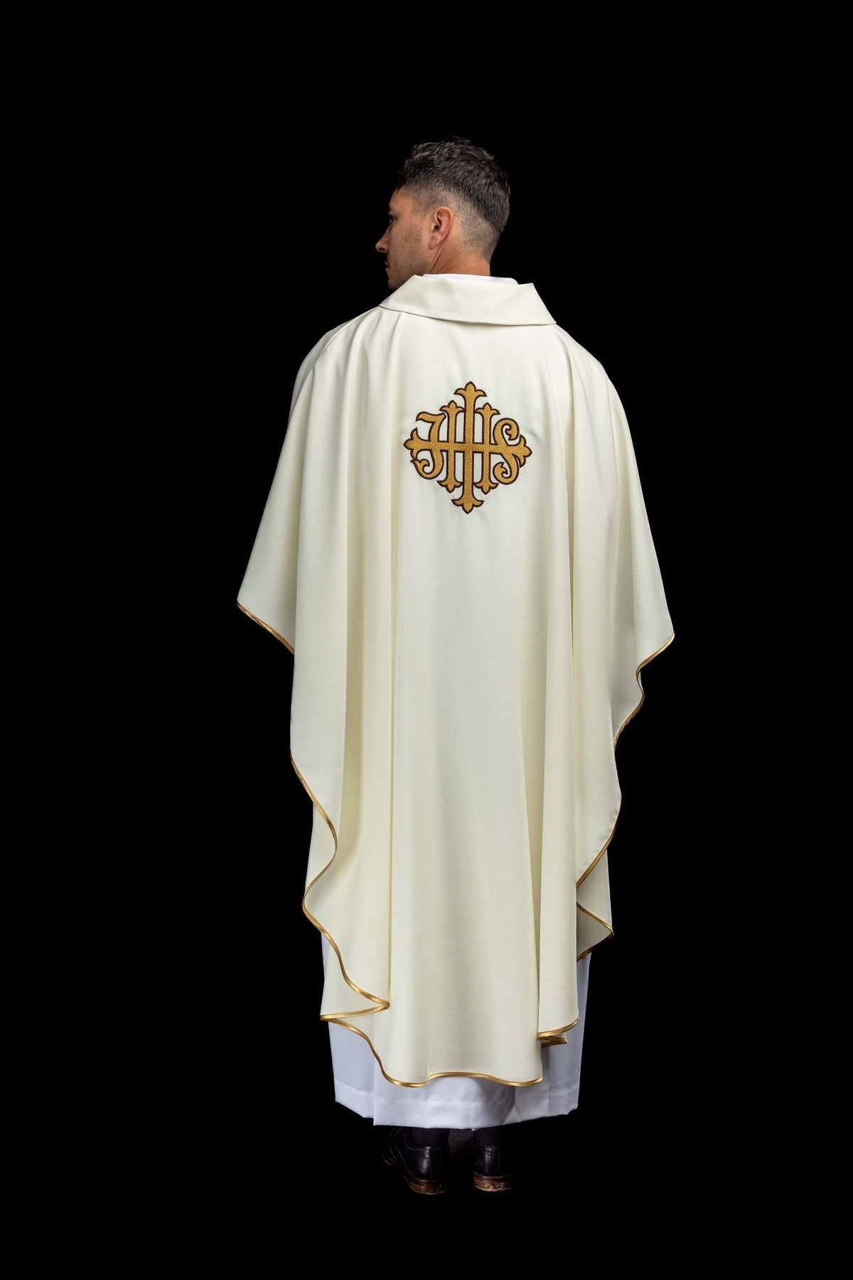 Ecru chasuble back view with gold JHS embroidery and trim