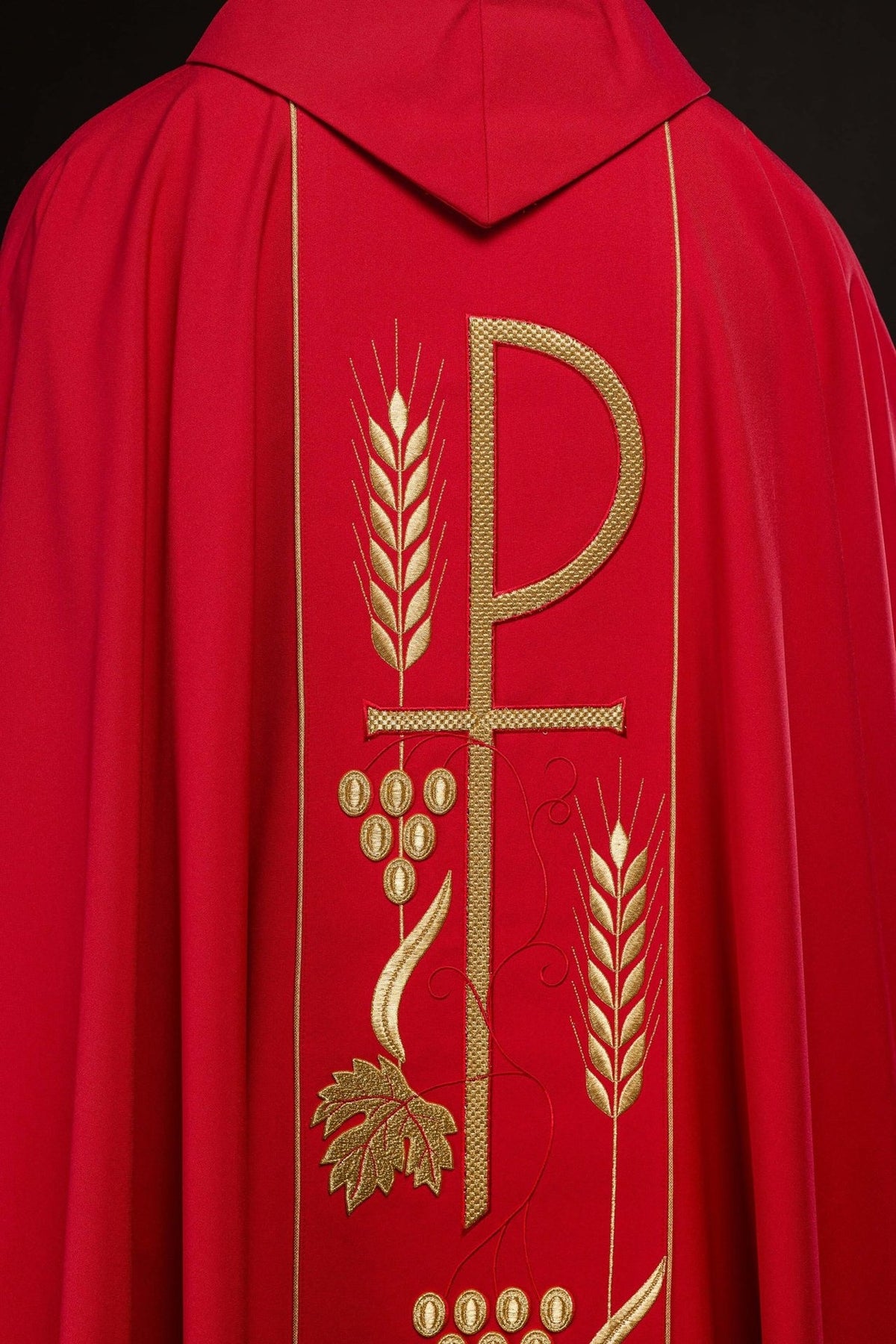 Red chasuble back detail with stand-up collar and gold embroidery