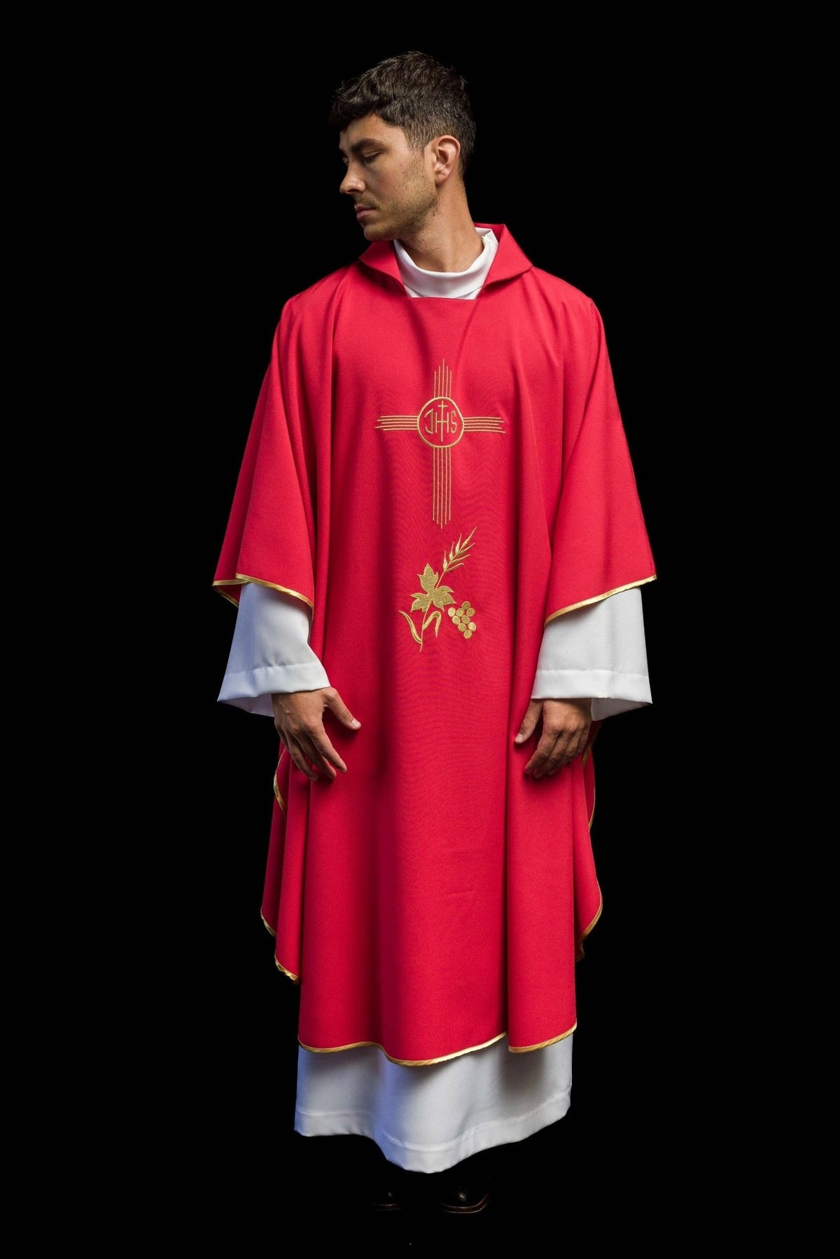 Red chasuble front view with gold IHS and floral embroidery