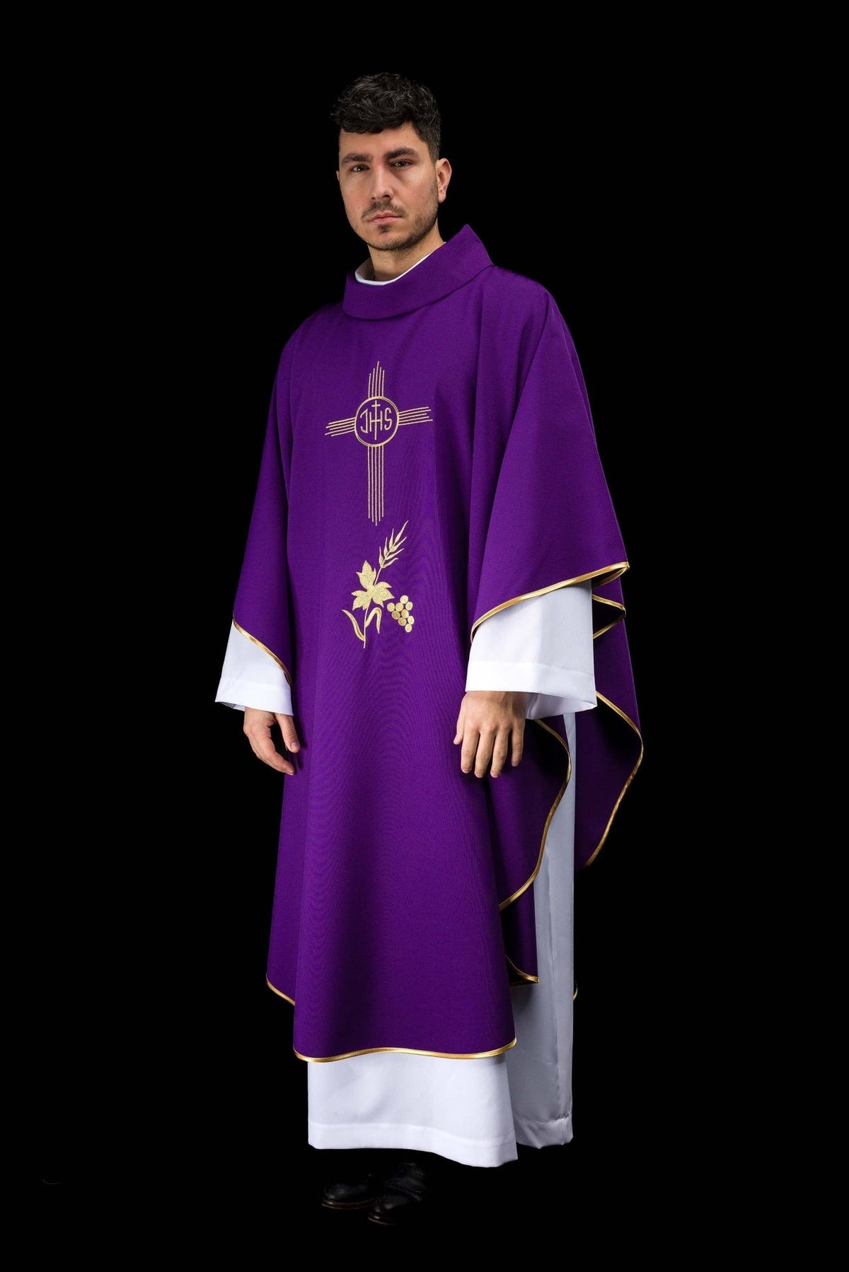 Purple chasuble with gold IHS embroidery, front three-quarter view