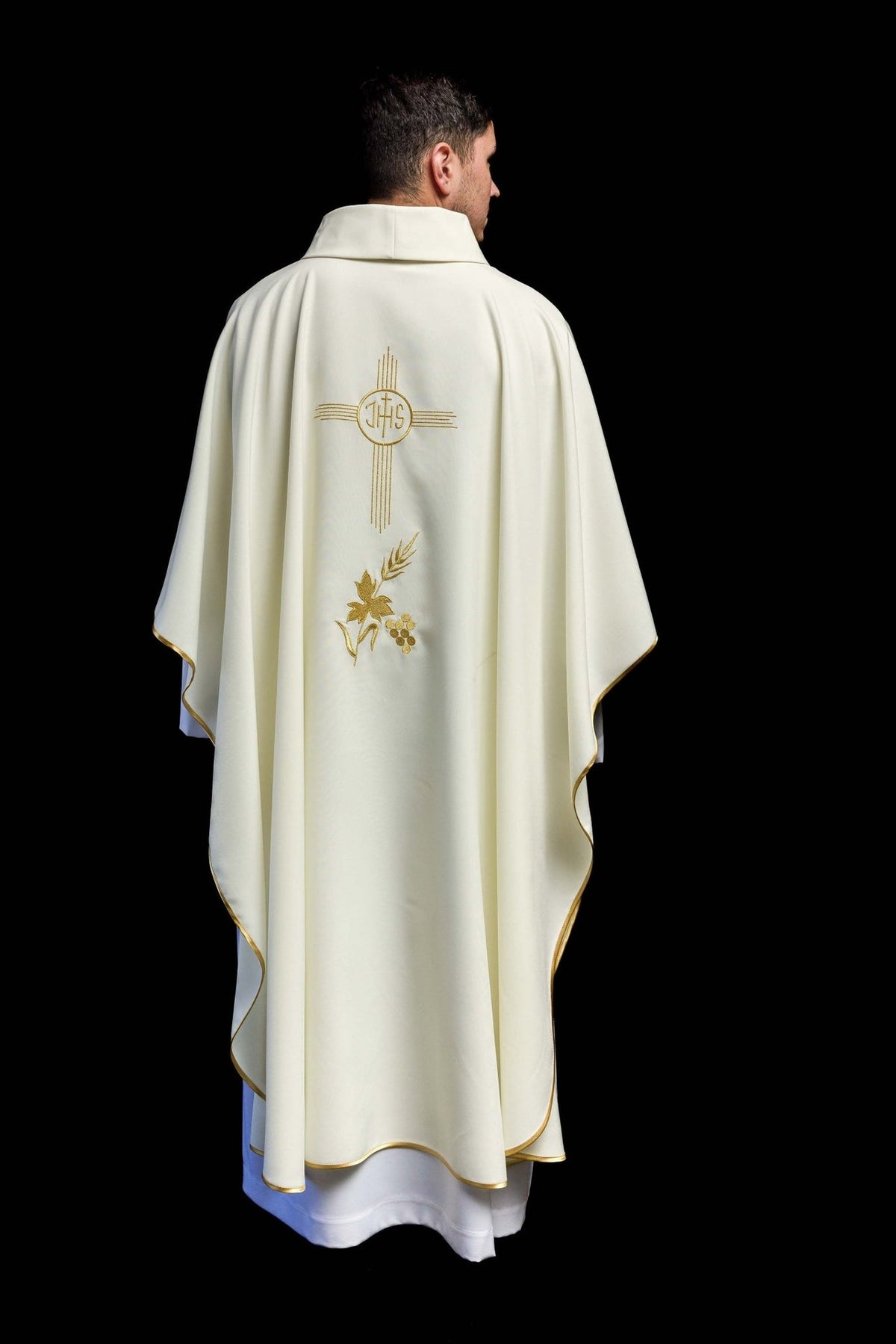 Ecru chasuble back view with gold IHS and floral embroidery