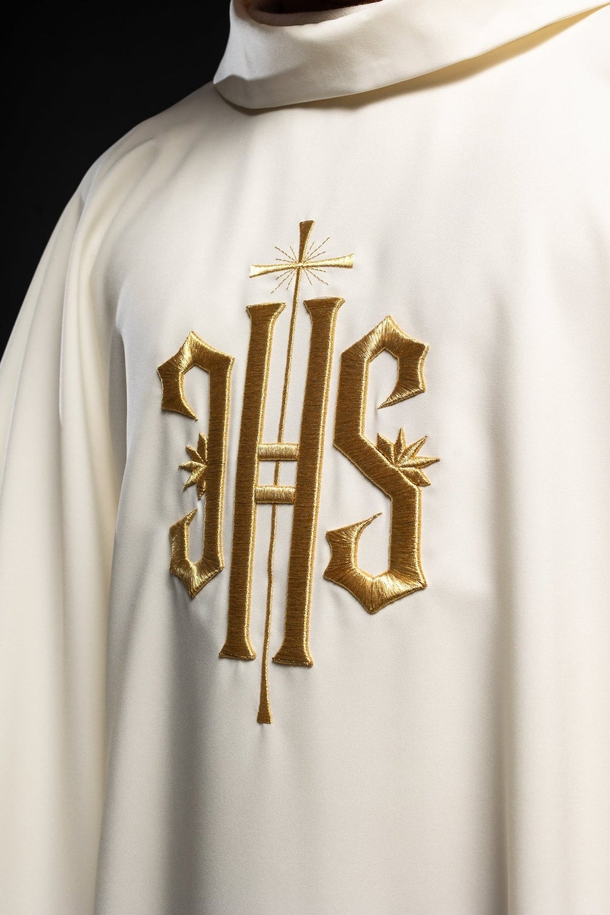 Ecru chasuble close-up of gold IHS embroidery and stand-up collar