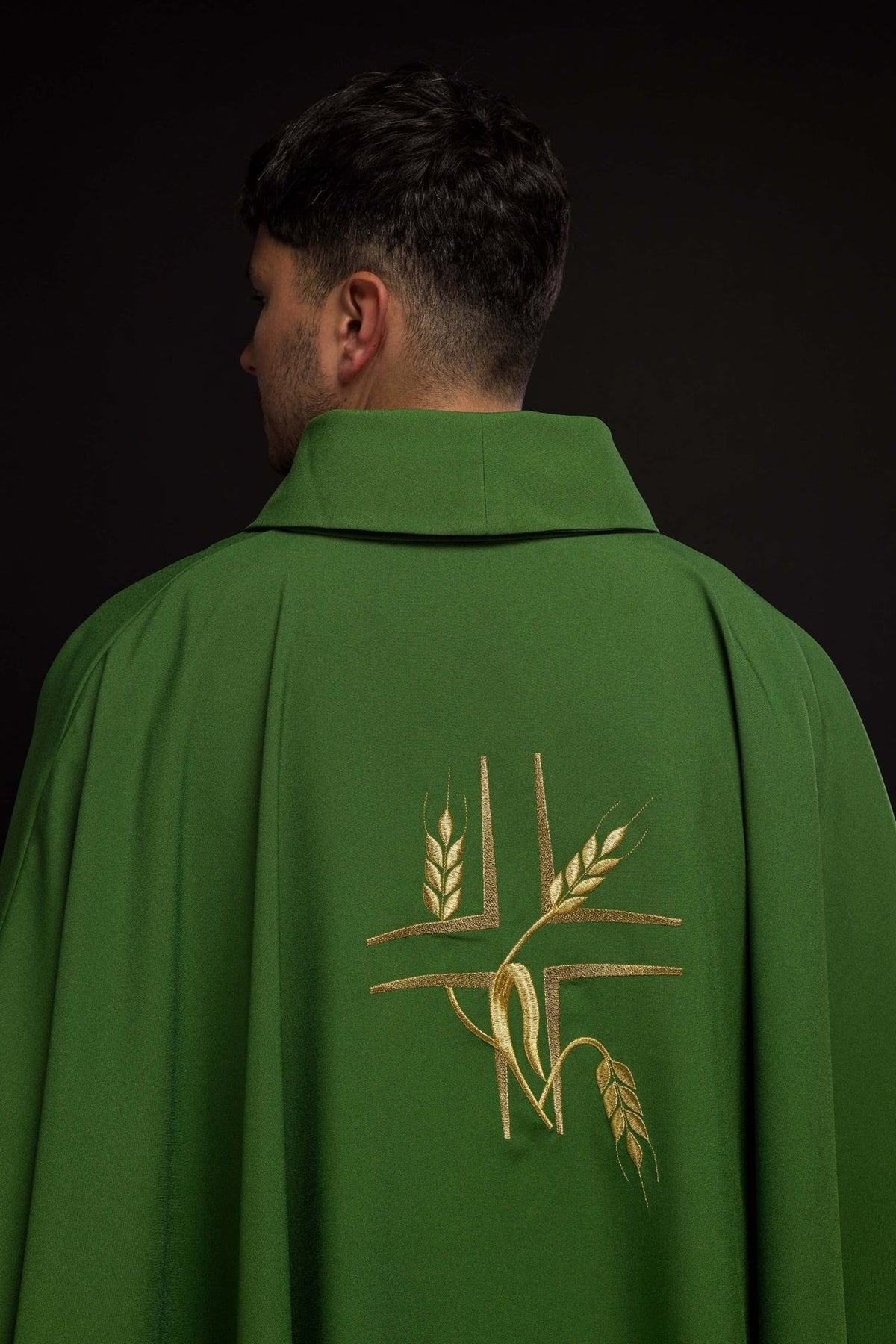 Green chasuble back close-up showing stand-up collar and plain fabric