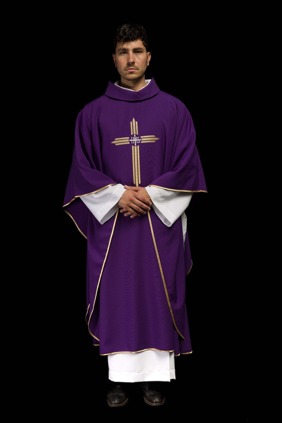 Purple chasuble rear three-quarter view with gold trim and cross embroidery