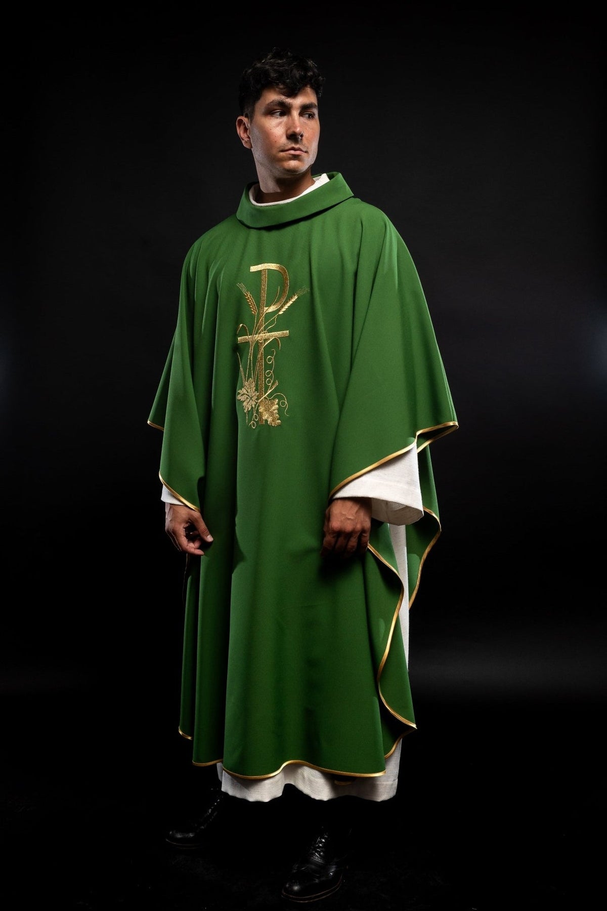Green chasuble, full front view with gold PAX embroidery and trim