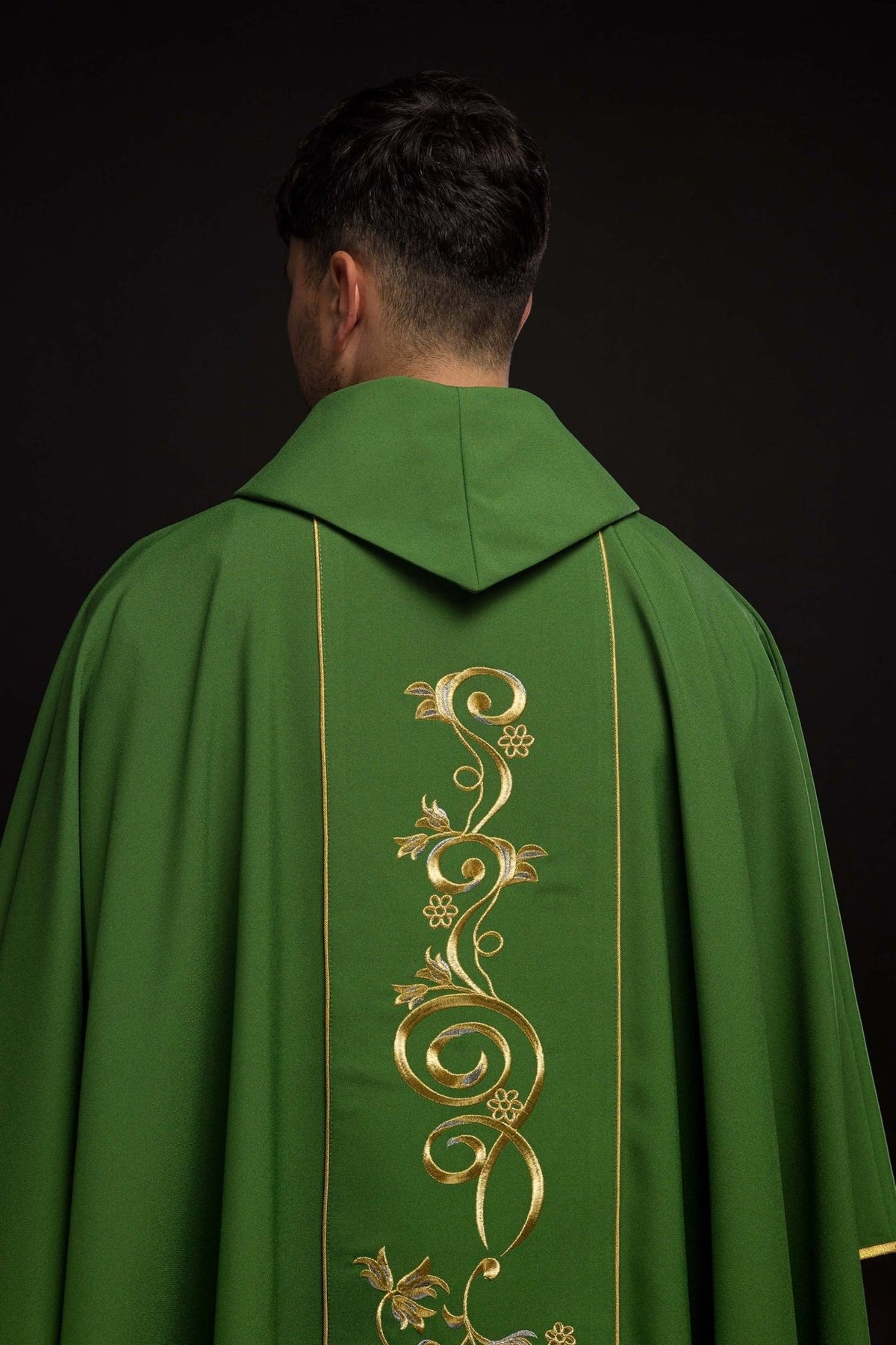 Green chasuble back view with gold floral orphrey embroidery