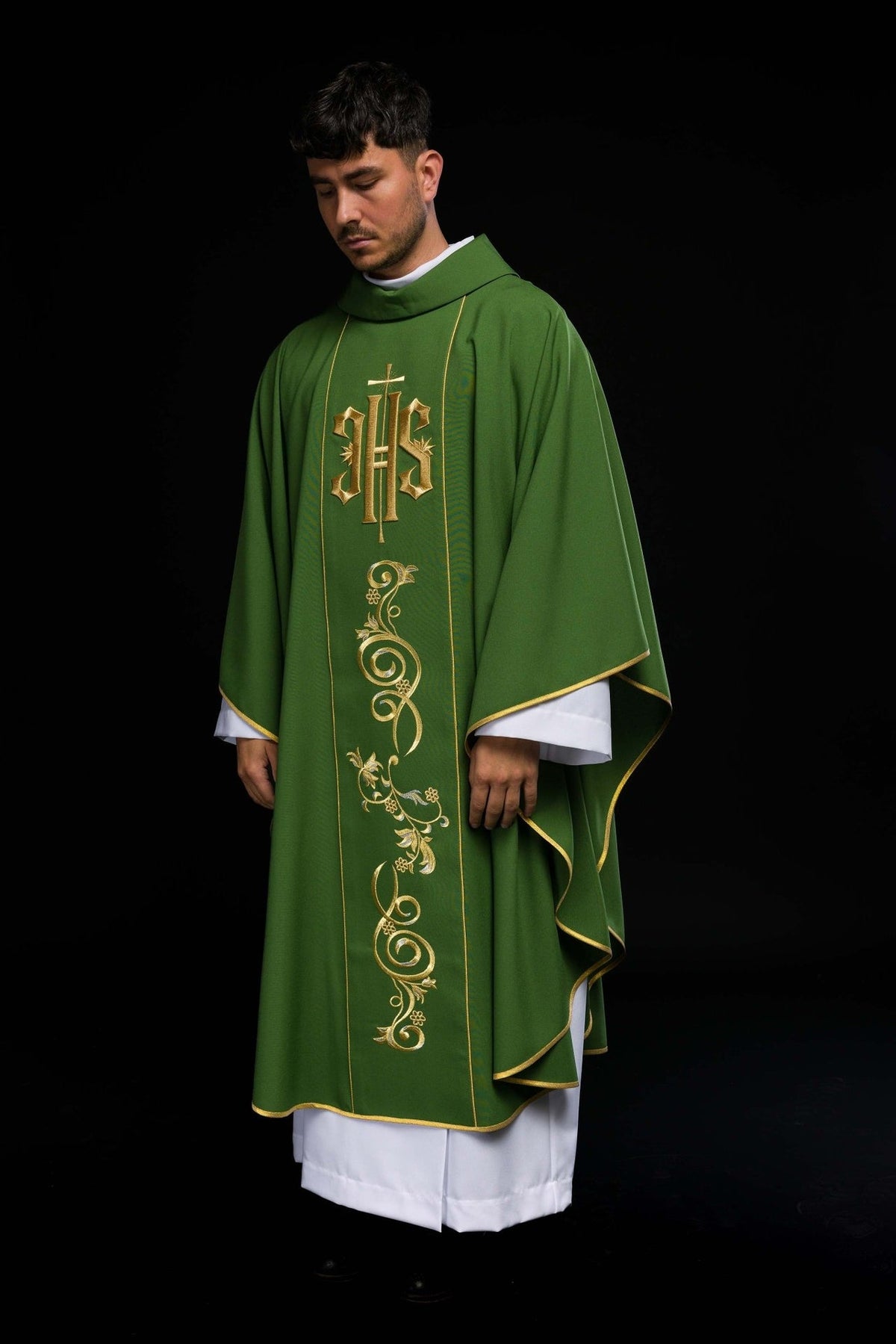 Green chasuble three-quarter front view with gold IHS and floral embroidery