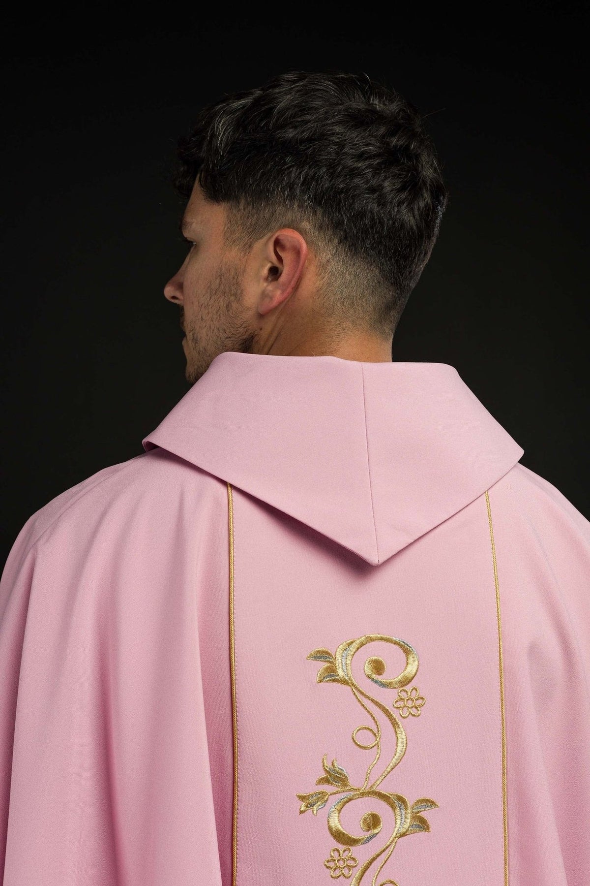 Rose chasuble side back view showing rose fabric and gold trim