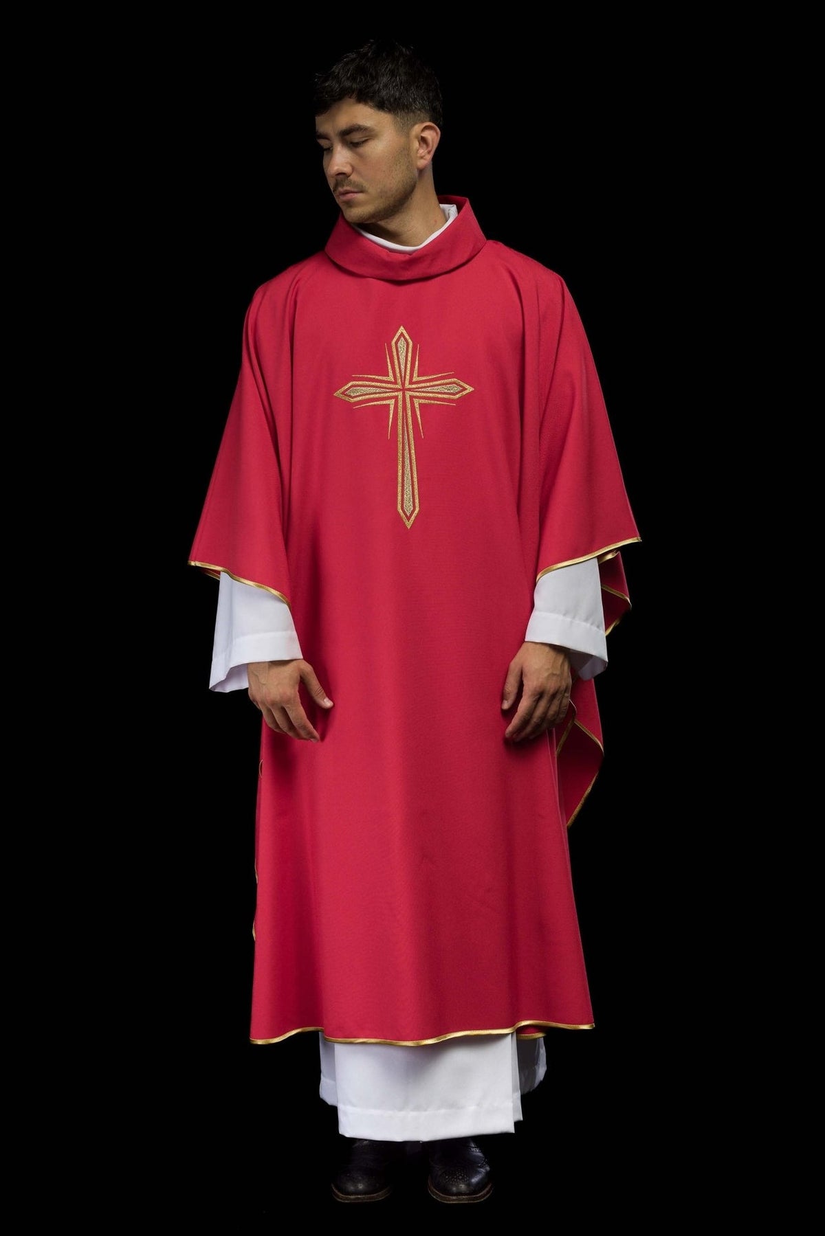 Red chasuble front view with gold embroidered cross and gold trim