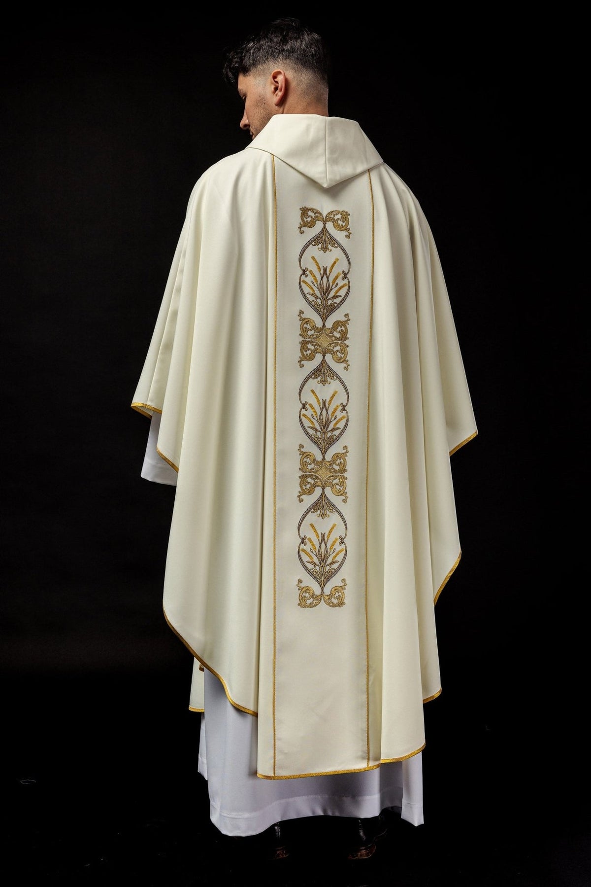 Ecru chasuble back view with repeated gold wheat embroidery