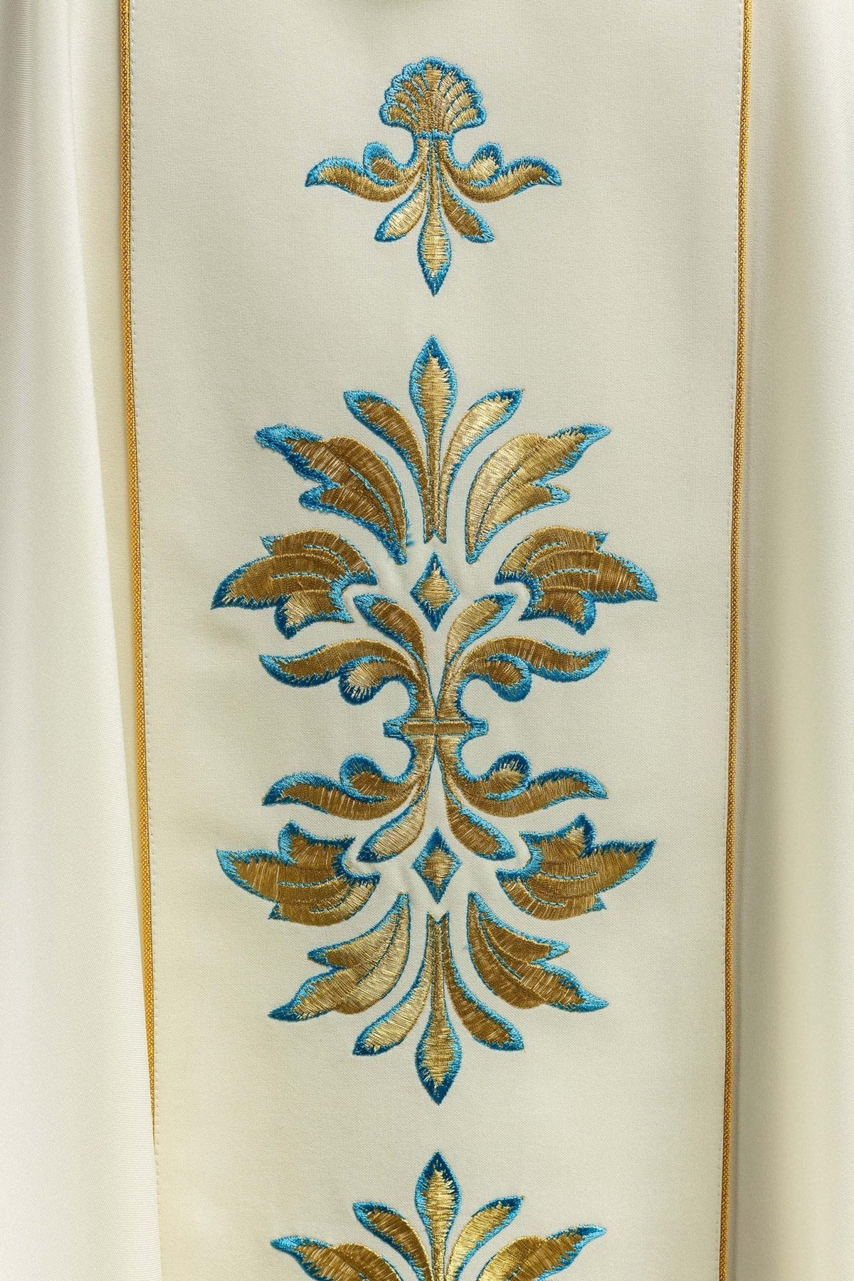 Marian chasuble, close-up of embroidered gold and blue floral motifs on the front