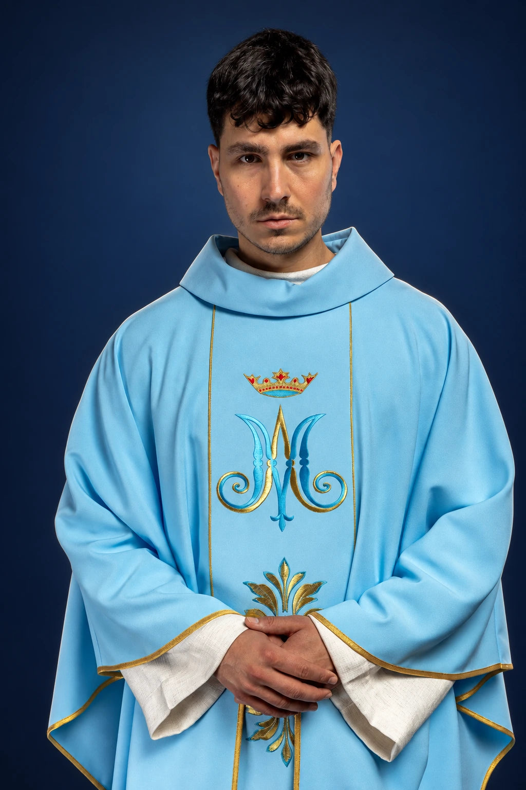 Embroidered Chasuble with a Blue Marian Motif, front worn view with blue and gold embroidery