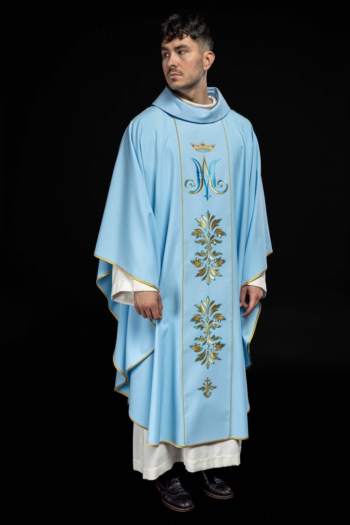 Blue Marian chasuble, full front view with gold trim and embroidered motifs