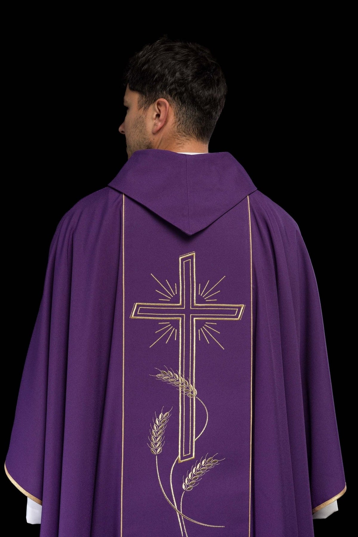 Purple chasuble back view with embroidered gold cross, wheat motifs and orphrey