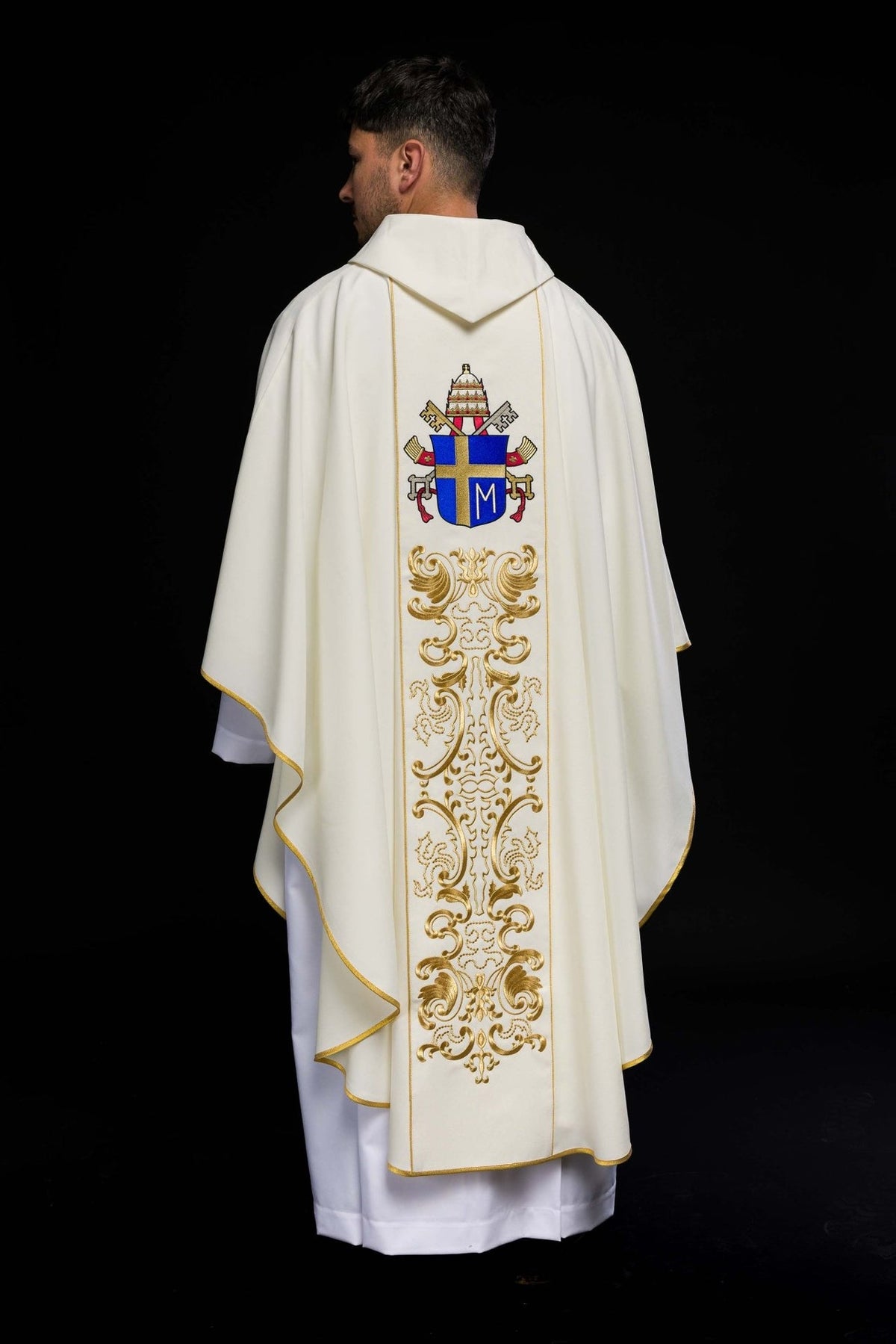 Chasuble back view with papal coat of arms and full gold embroidered panel