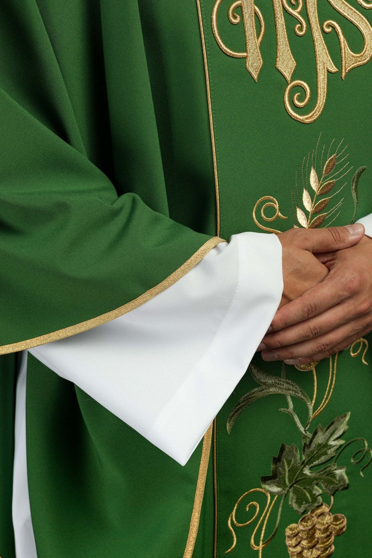 Green chasuble, close-up view of gold trim and wheat embroidery