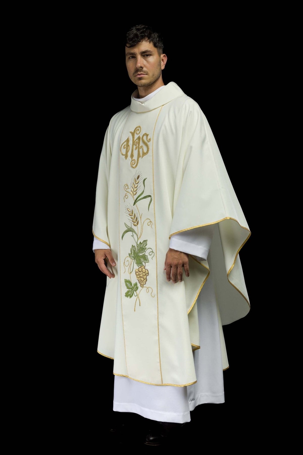 Ecru chasuble side view with gold trim and embroidered wheat and grapes