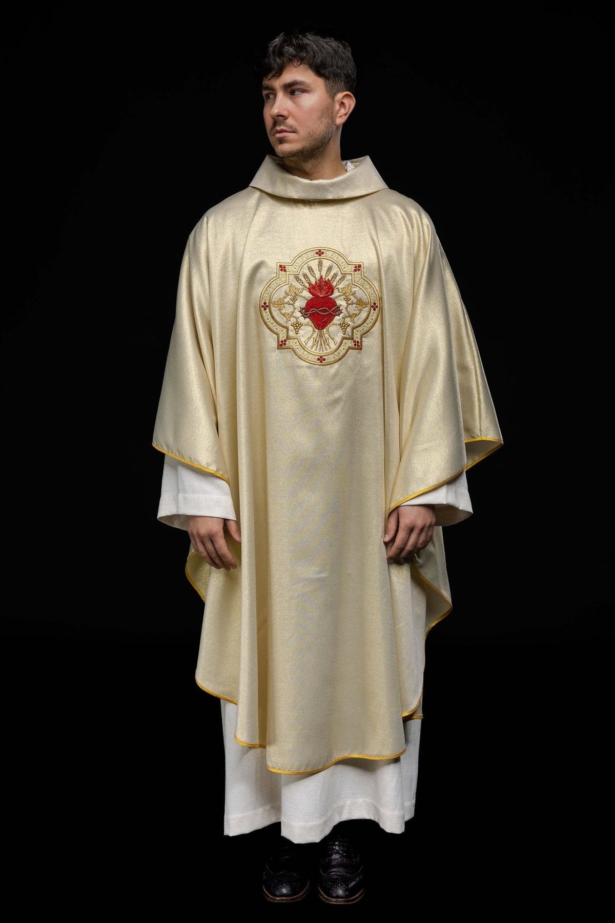 Gold embroidered chasuble, full front view with Sacred Heart of Jesus motif