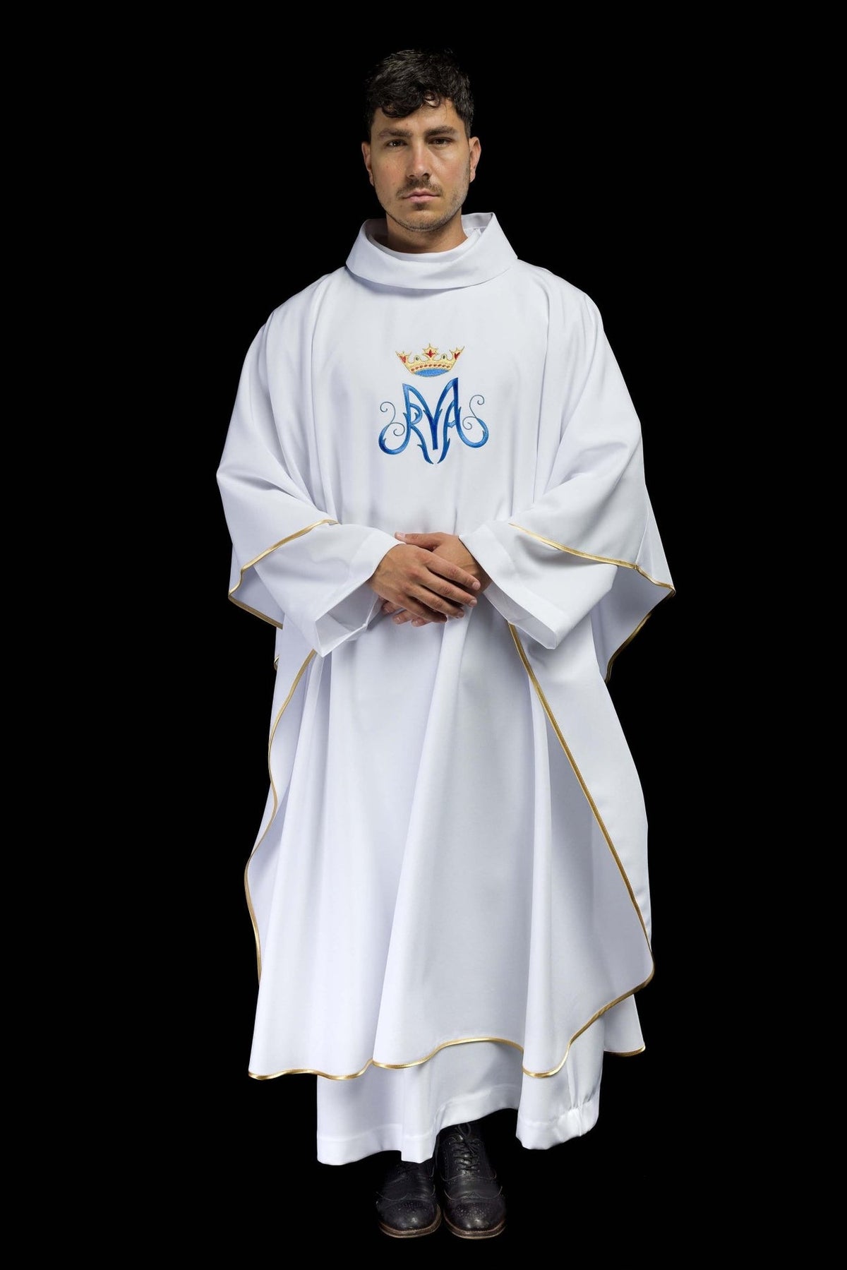 White Marian chasuble worn from the front, showing flowing shape and gold trim