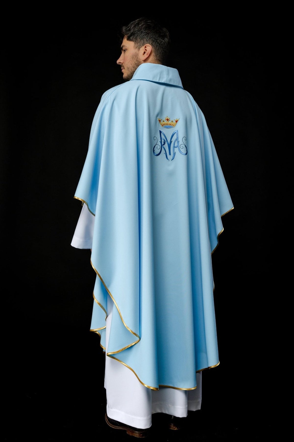 Blue Marian chasuble back view with crowned Marian symbol embroidery and gold trim