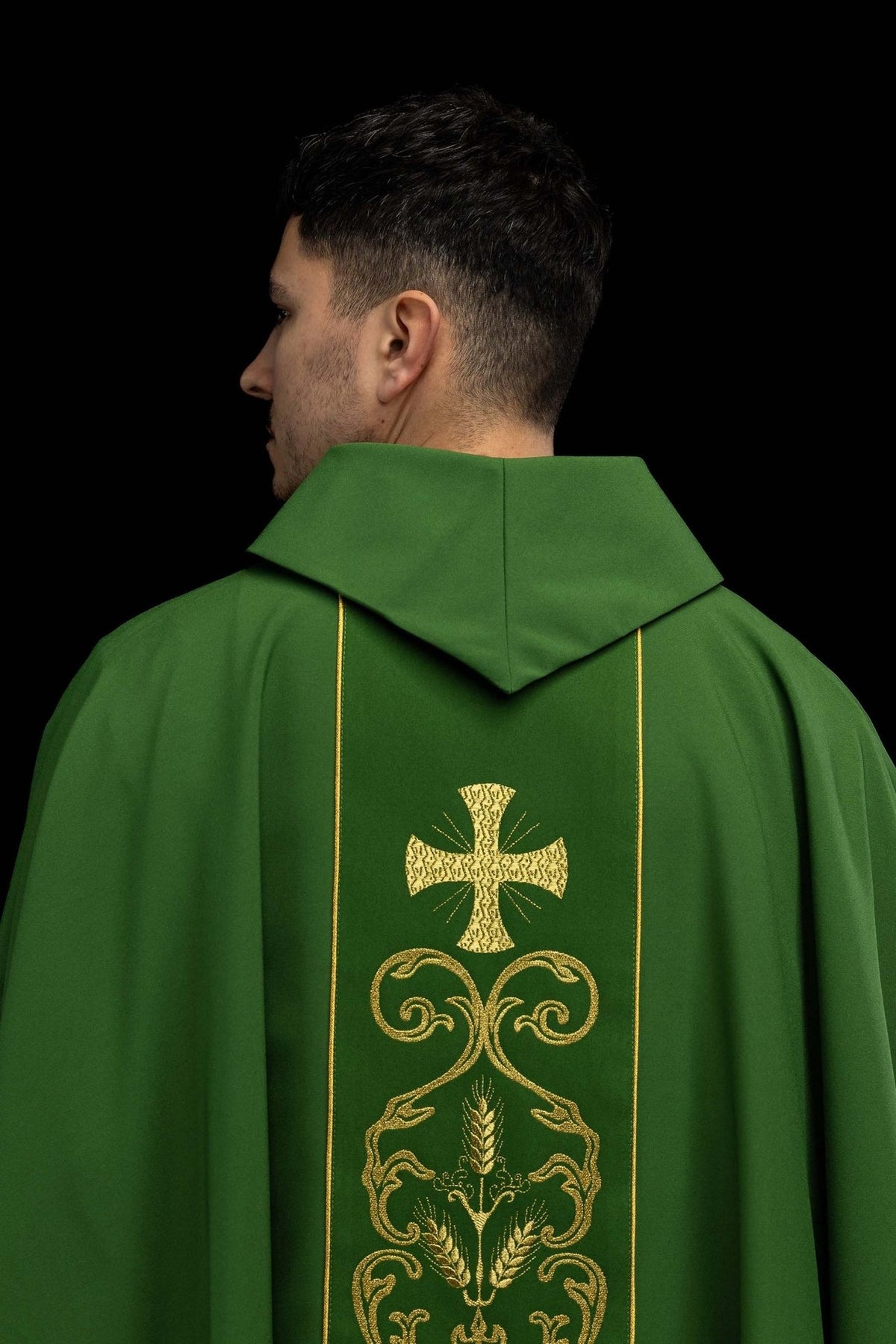Green chasuble, back worn view with embroidered orphrey and gold trim