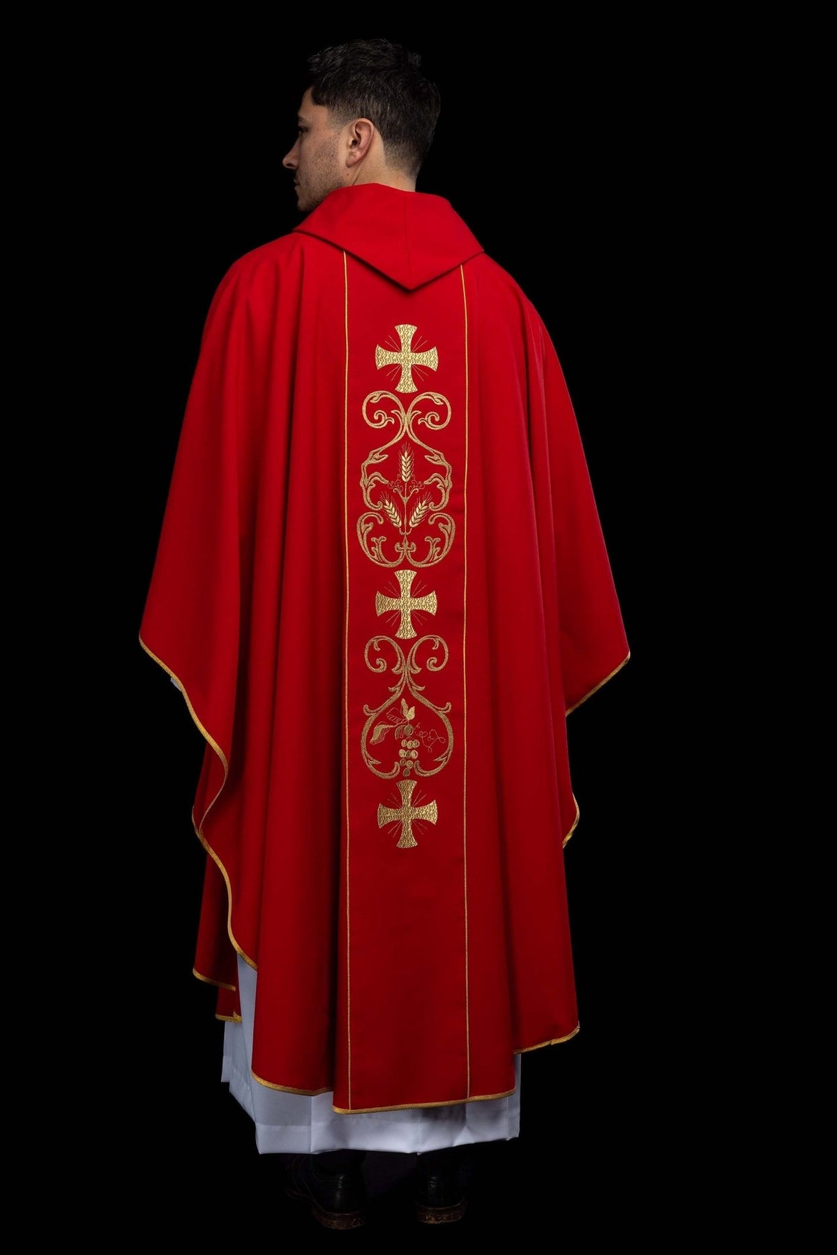 Red chasuble, full back view with gold trim and embroidered orphrey