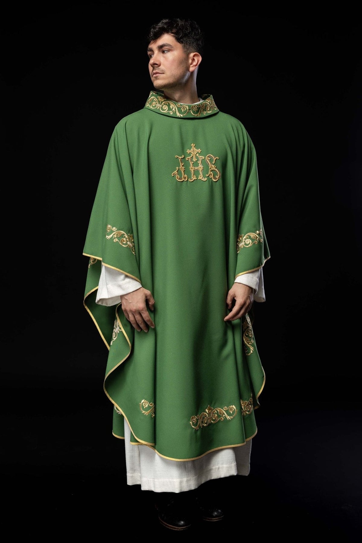 Green chasuble back view with gold IHS embroidery and trim