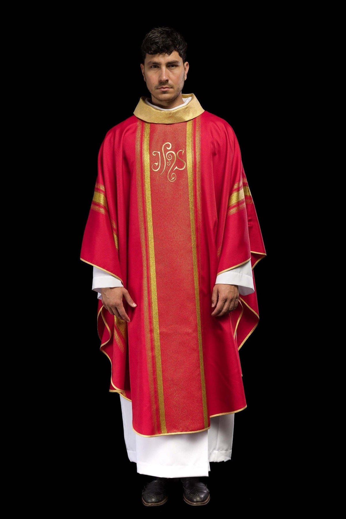 Red chasuble, full front view with embroidered IHS design and gold trim