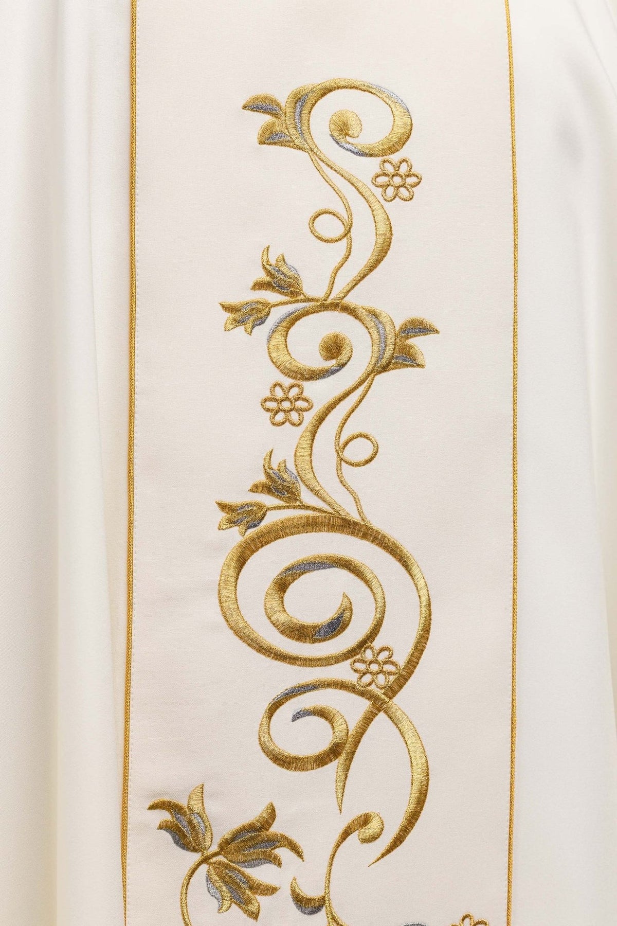 Holy Family chasuble, close-up of gold embroidered floral scrollwork