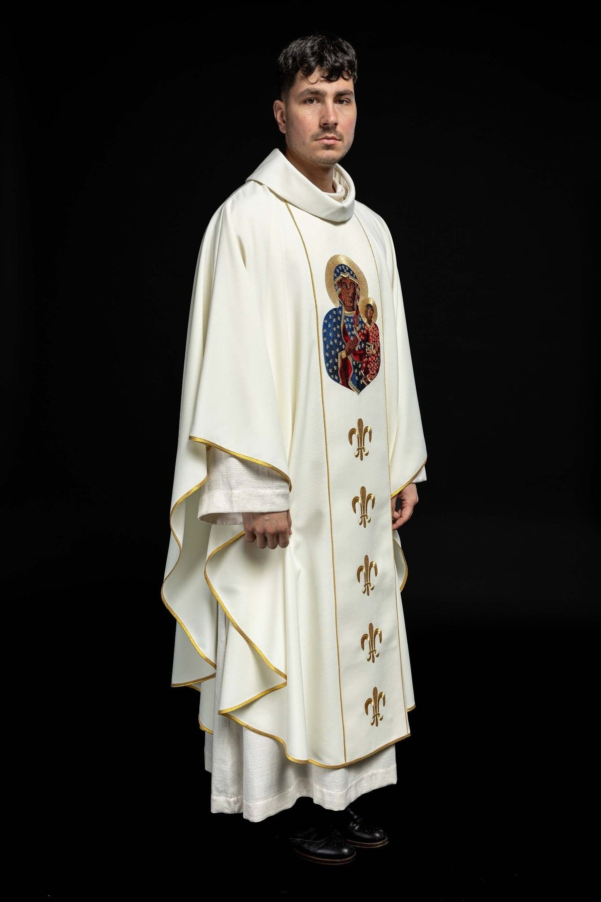 Ecru chasuble side view with Our Lady embroidery and gold trim
