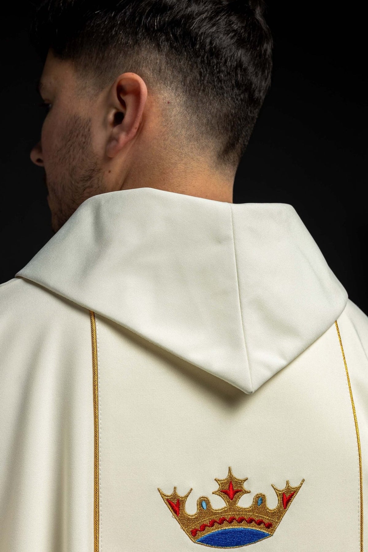 Ecru chasuble back view with crown and blue Marian embroidery