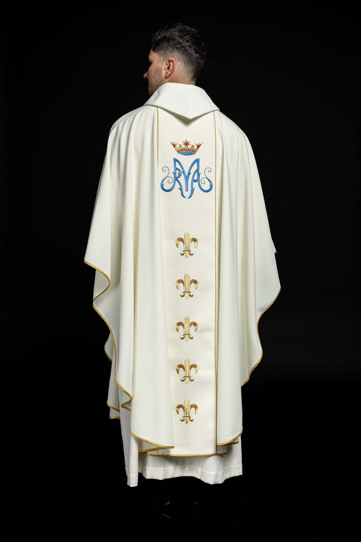 Ecru chasuble back detail with Marian monogram and gold fleur-de-lis embroidery